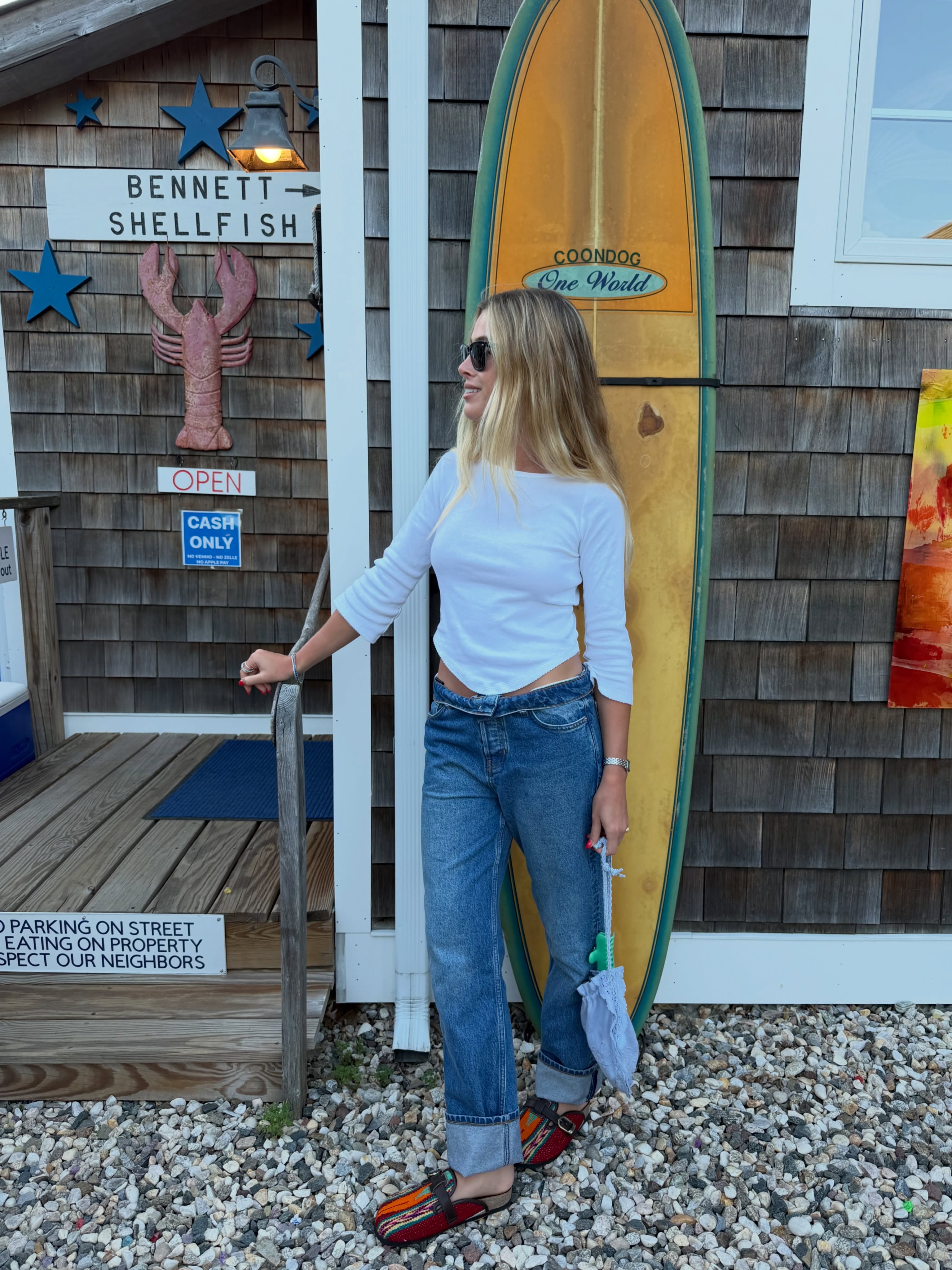 A woman wearing fall 2026 cuffed-jeans outfit idea.