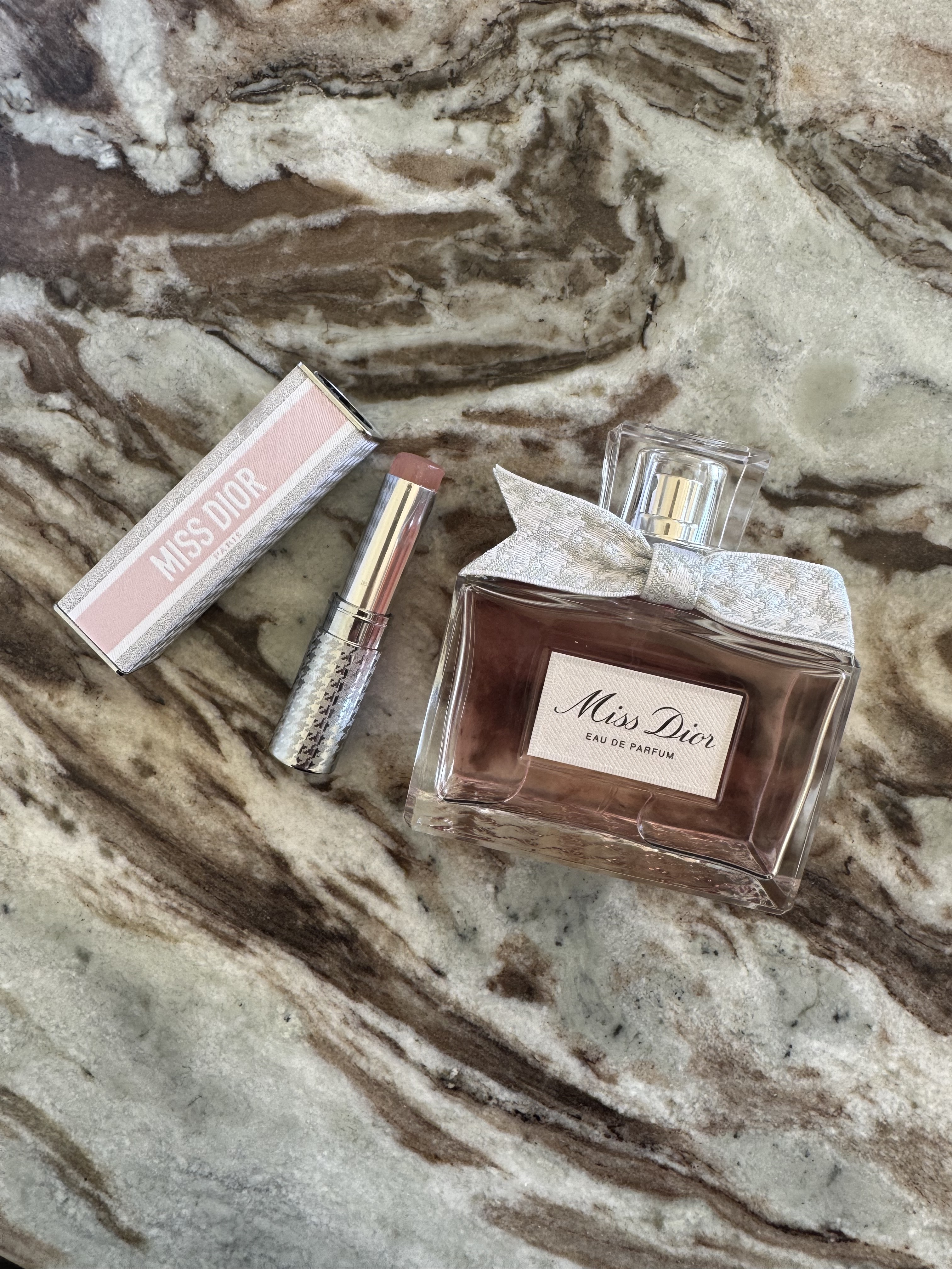 The 2021 Miss Dior eau de parfum stick next to the new Miss Dior eau de parfum for 2026