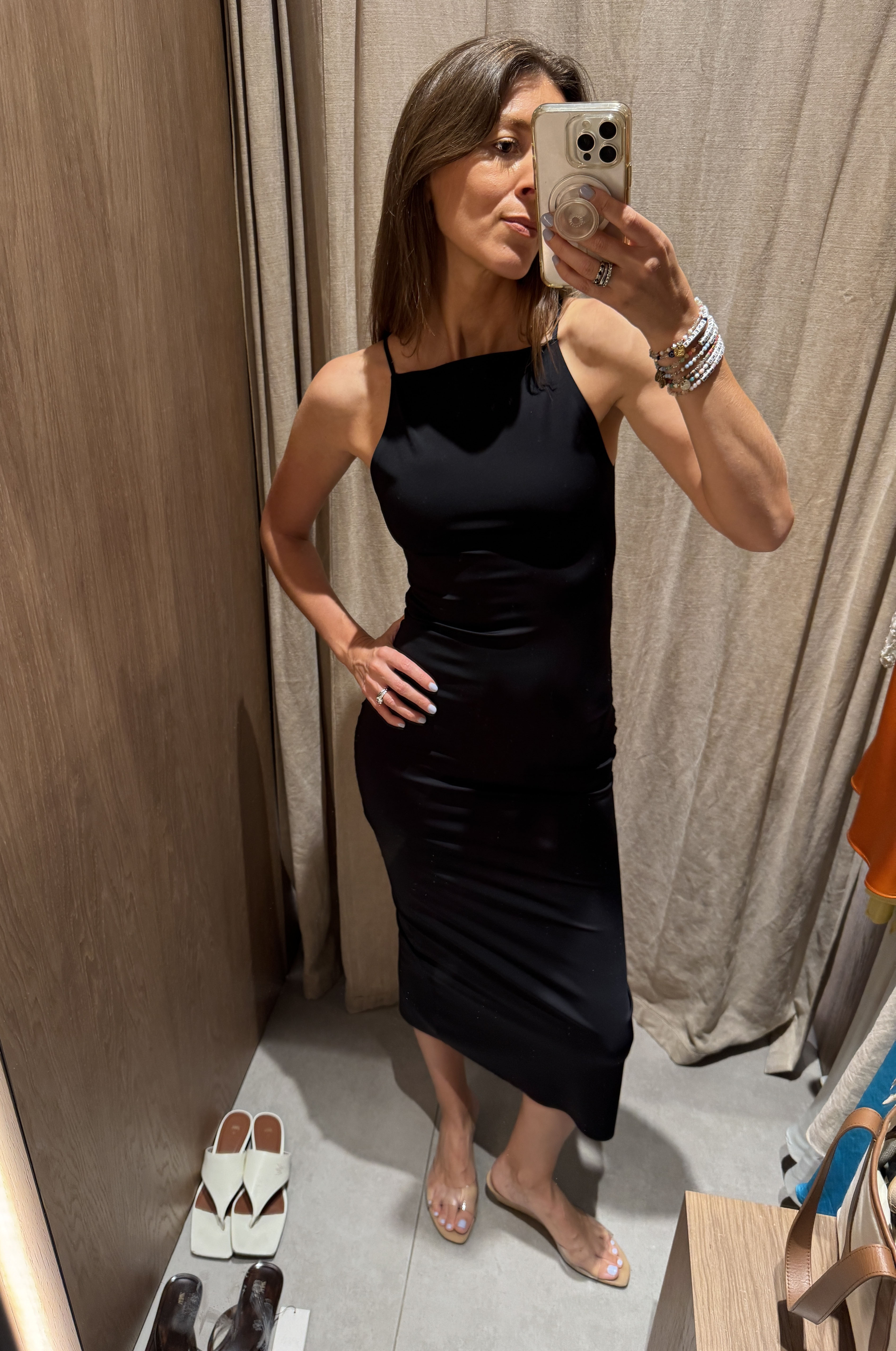 Woman in a black Zara dress