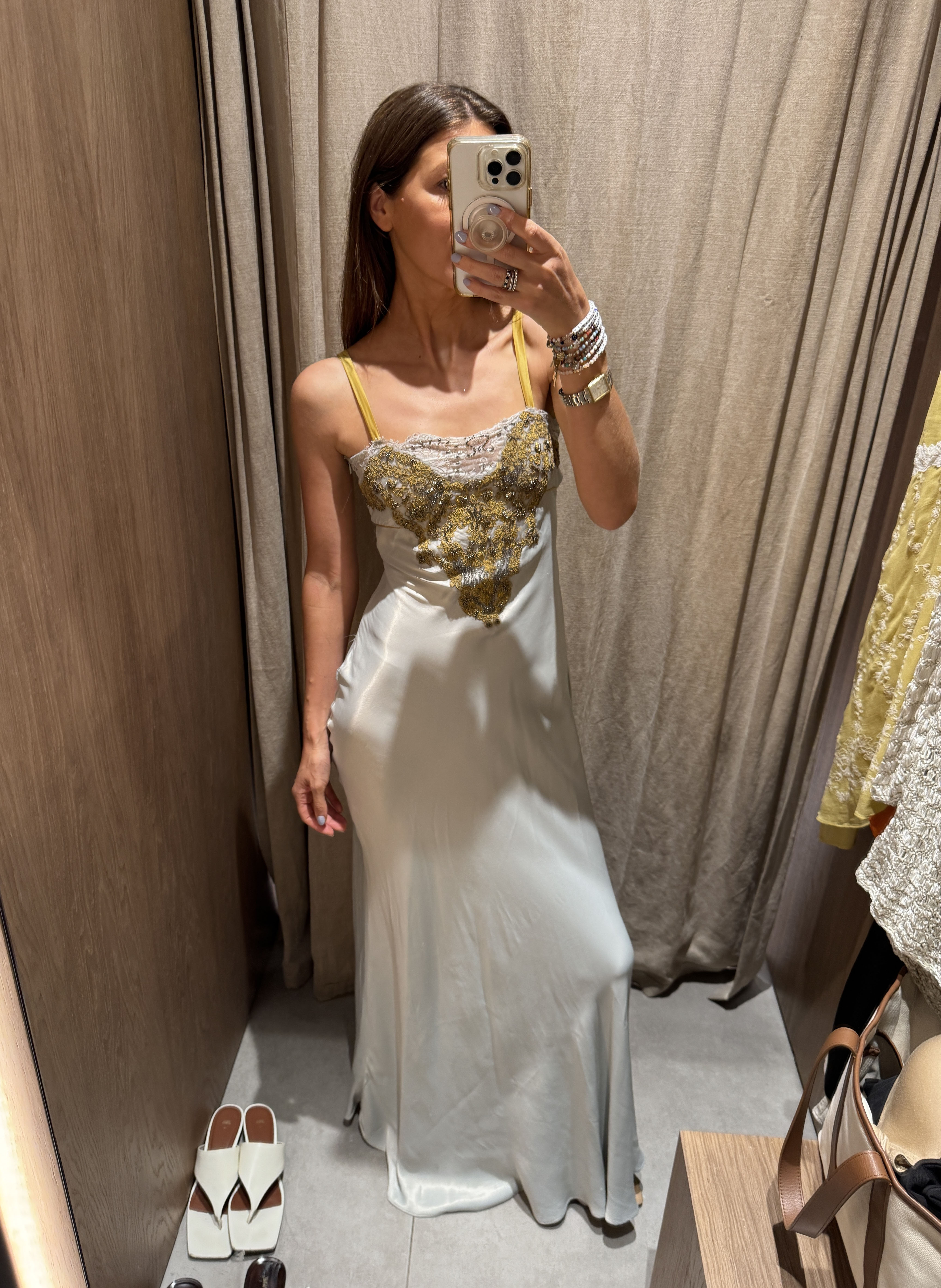 Judith Jones in a Zara satin and embellished dress