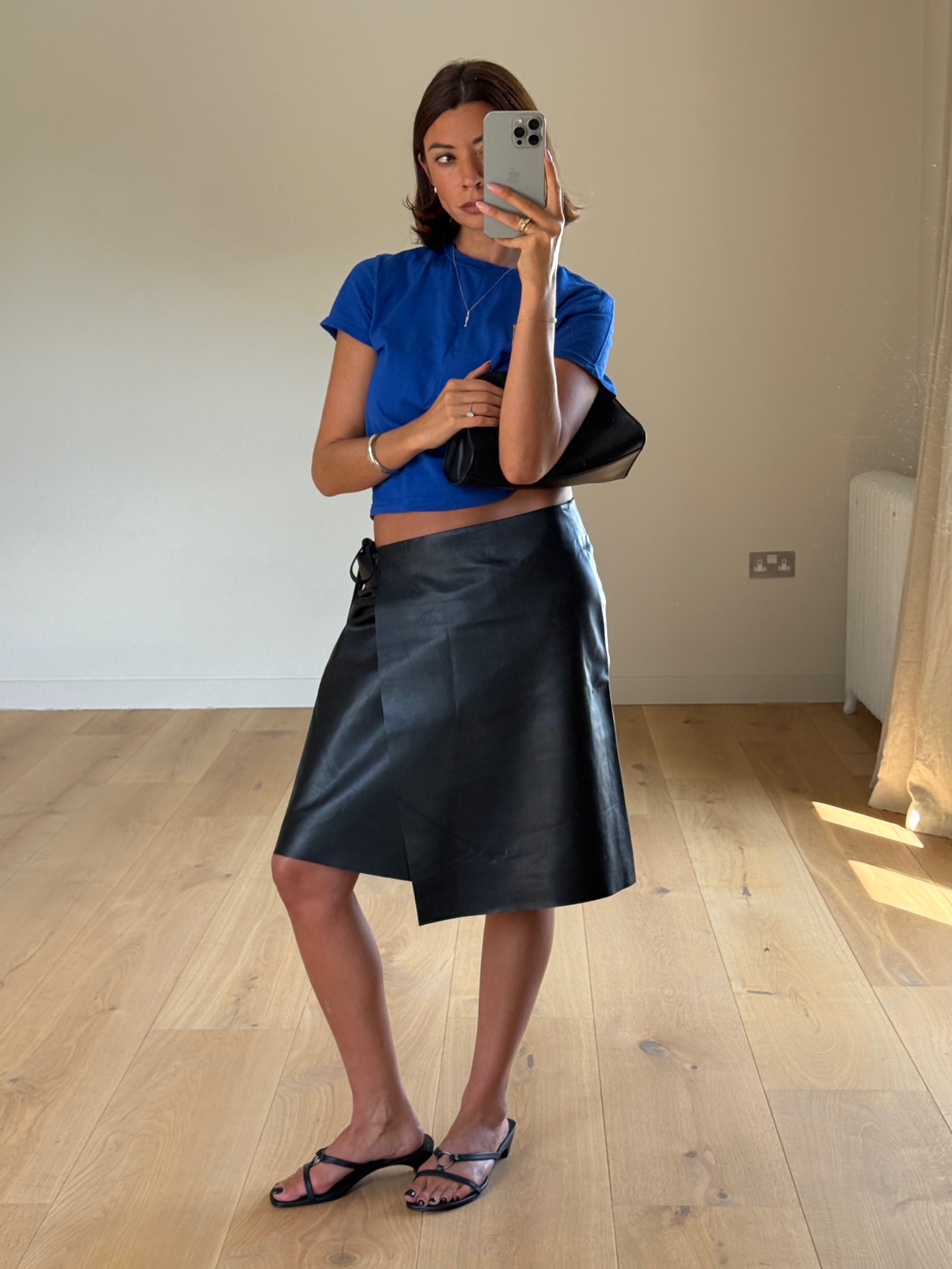 An image of a woman wearing non jeans fall outfit idea 2026