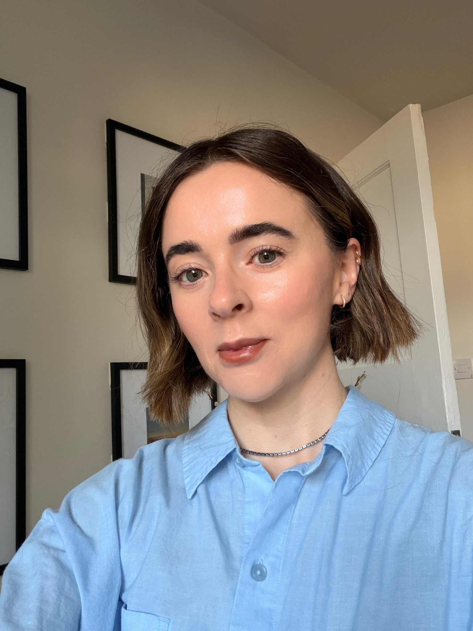 Freelance beauty editor Grace Day wearing Rhode's lipstick in Balance