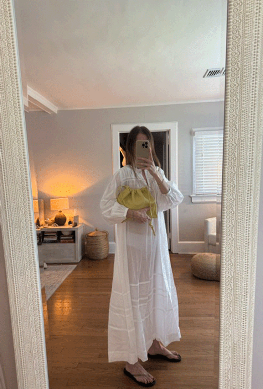 Tessa Faye O'Connell wearing a butter yellow bag.