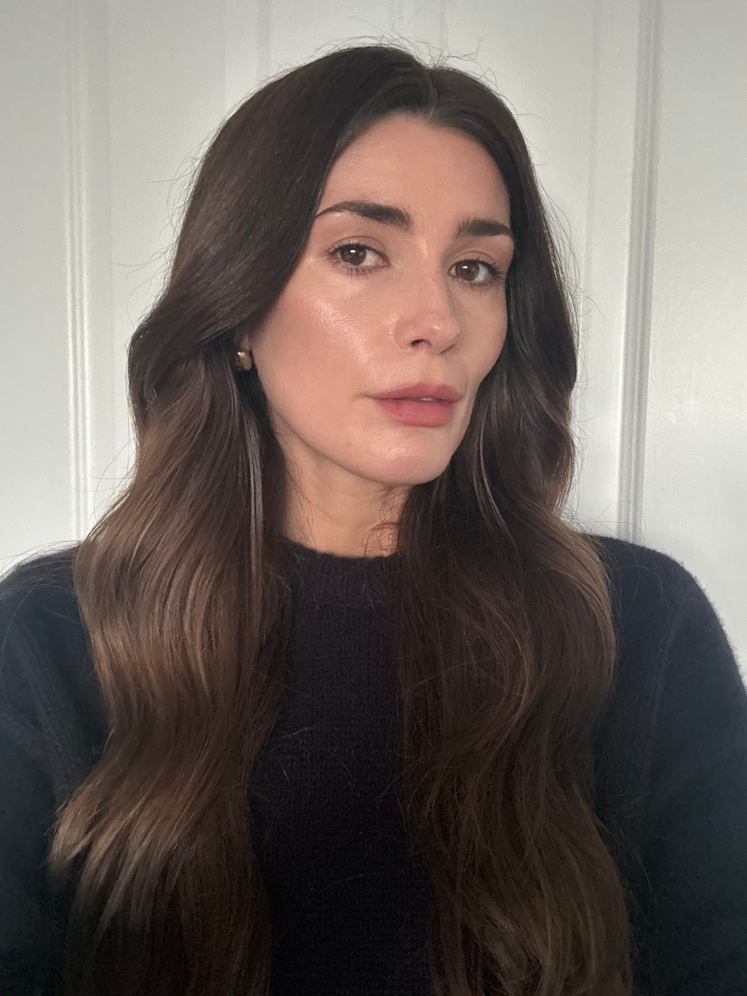 Beauty editor Eleanor Vousden wearing Merit's lipstick in Bespoke