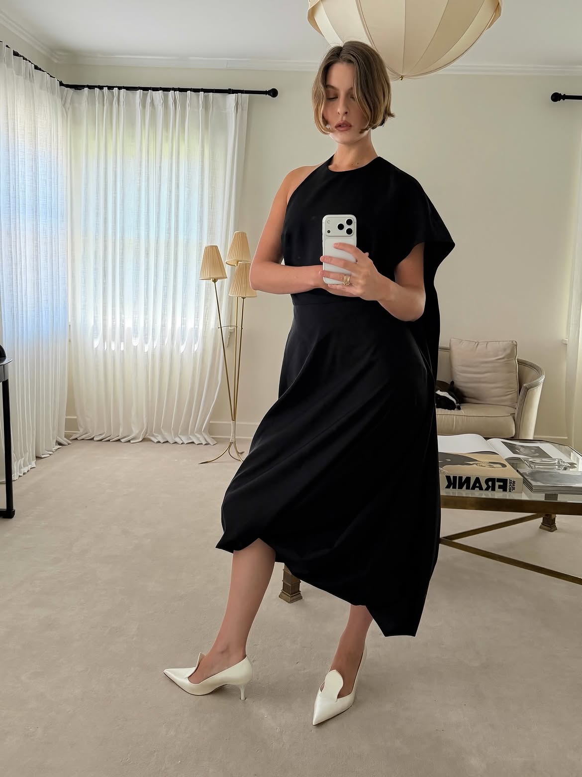 Christie Tyler wearing satin pumps
