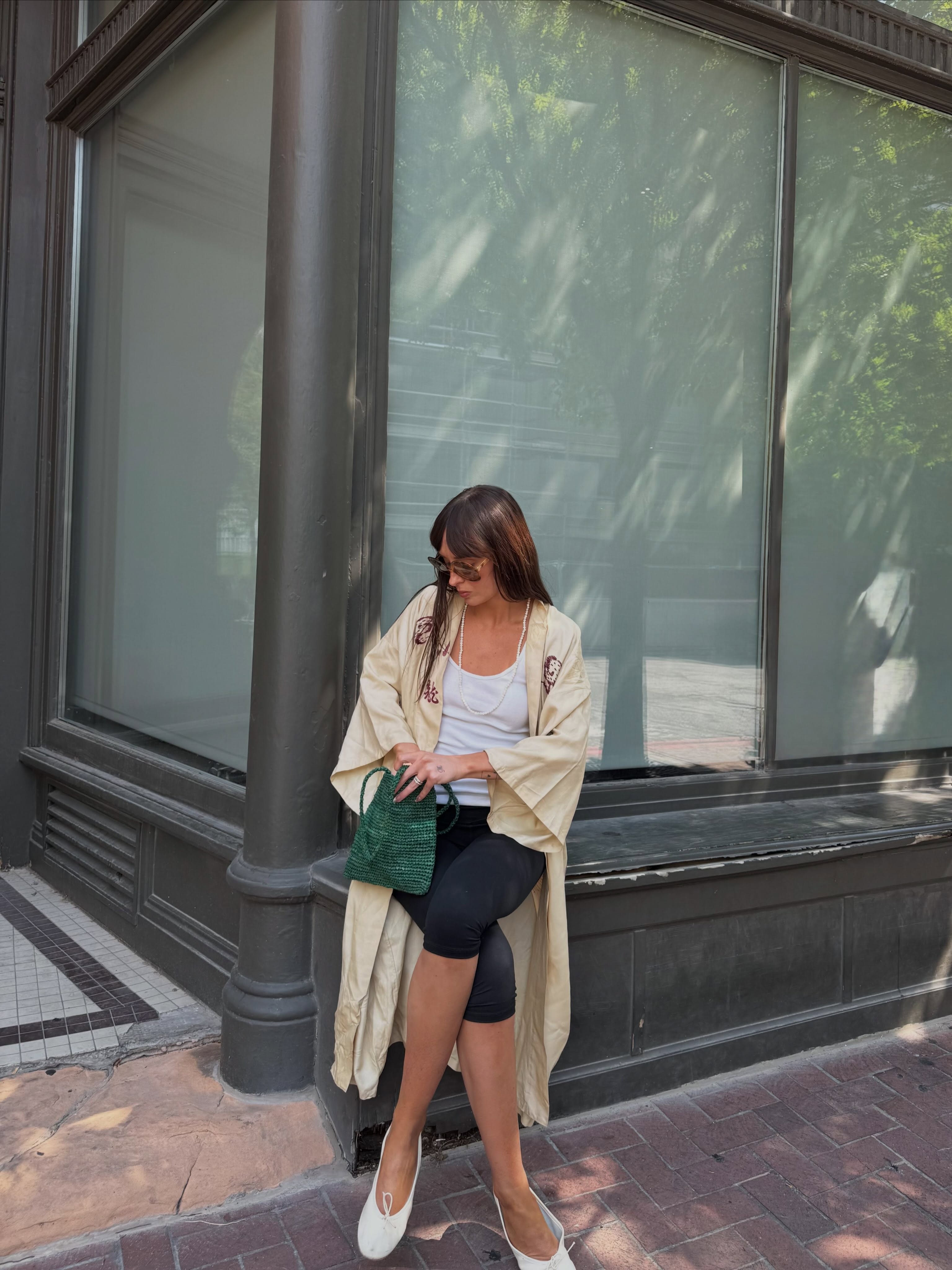 A woman wearing fall shoes with capri pants in 2026.