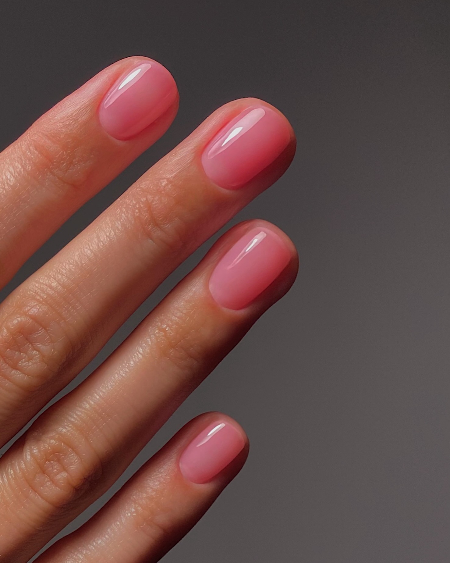 Jelly pink nails.