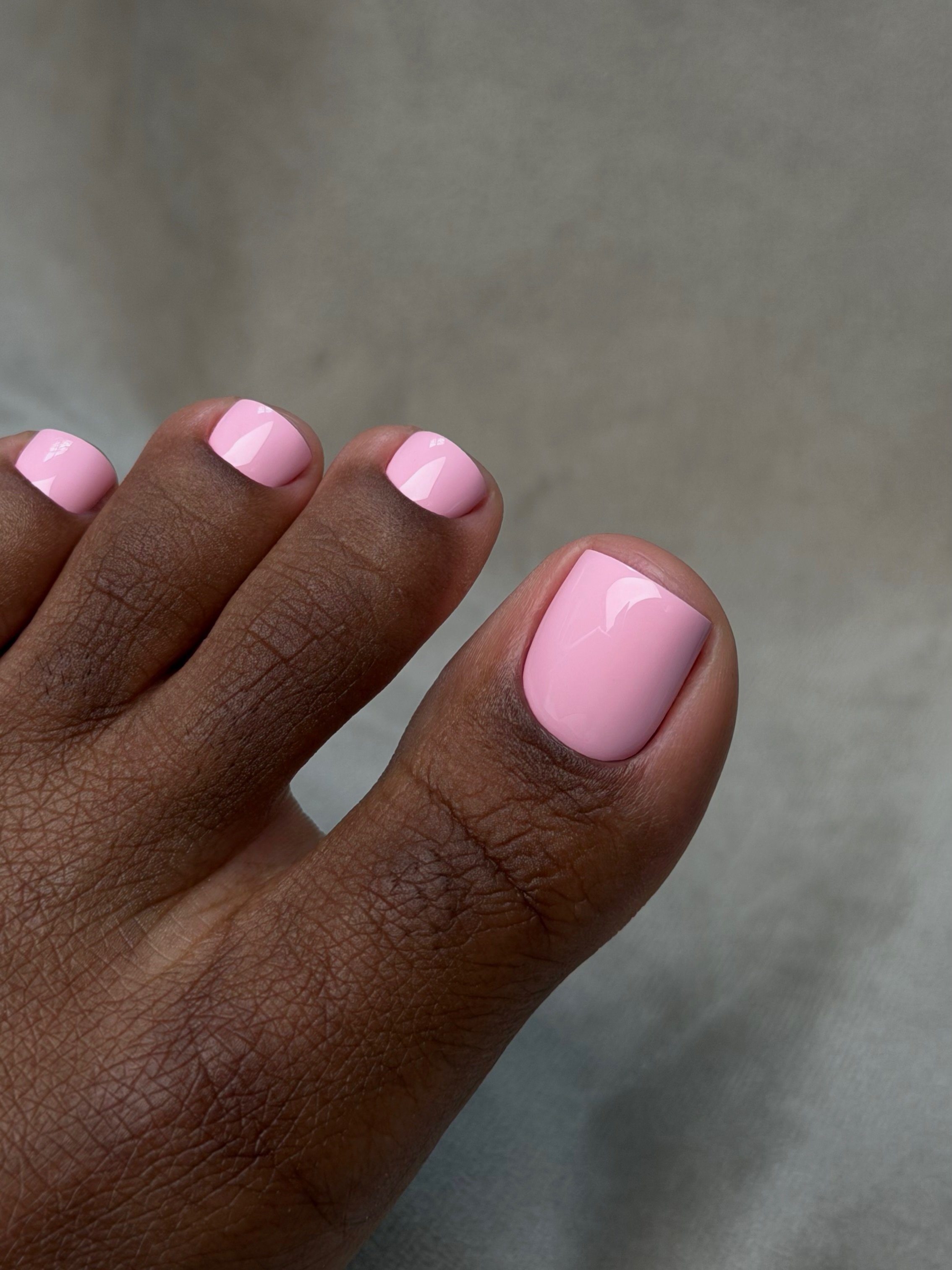 Lilac pink nails.