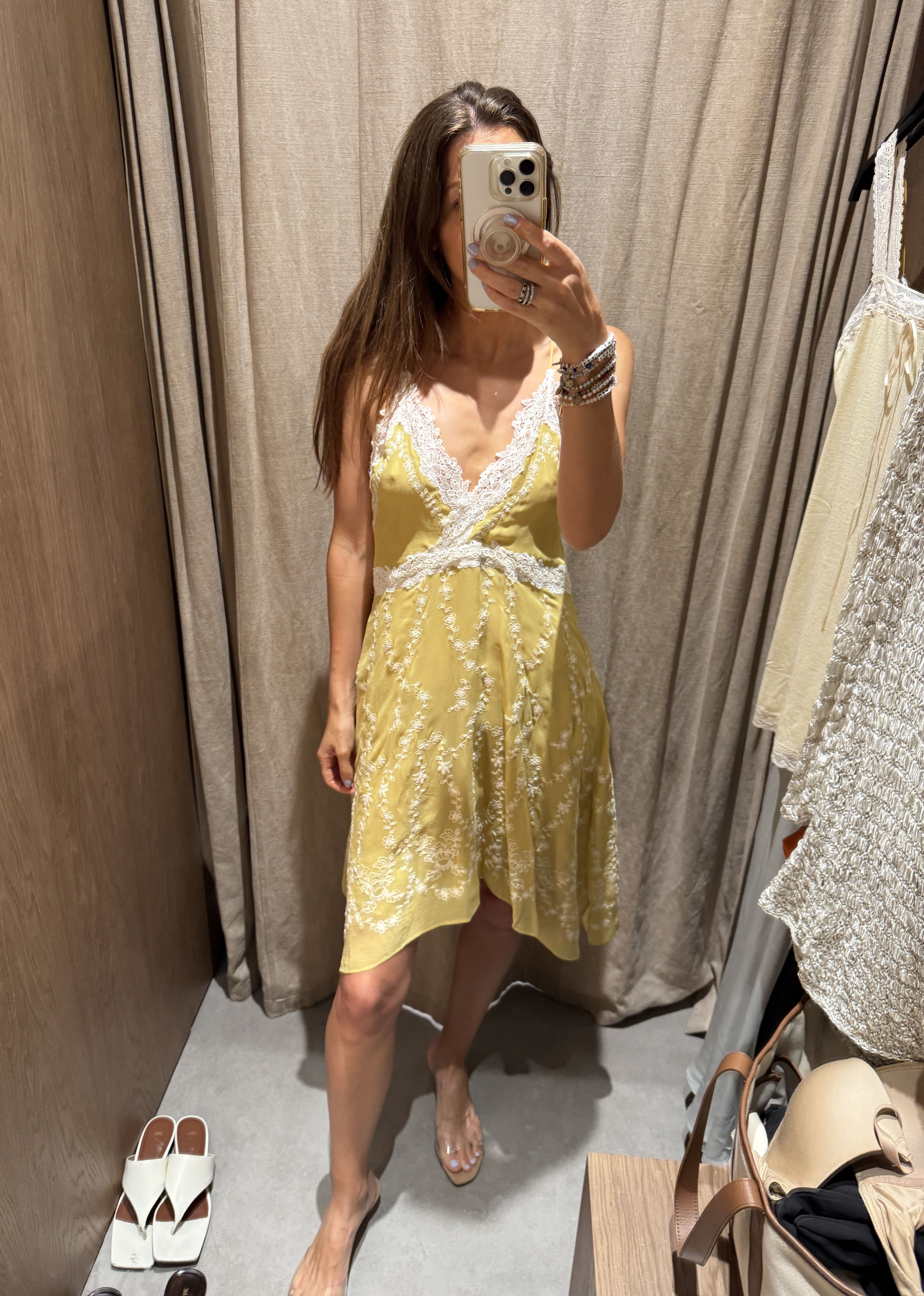 Judith Jones in a yellow embroidered dress