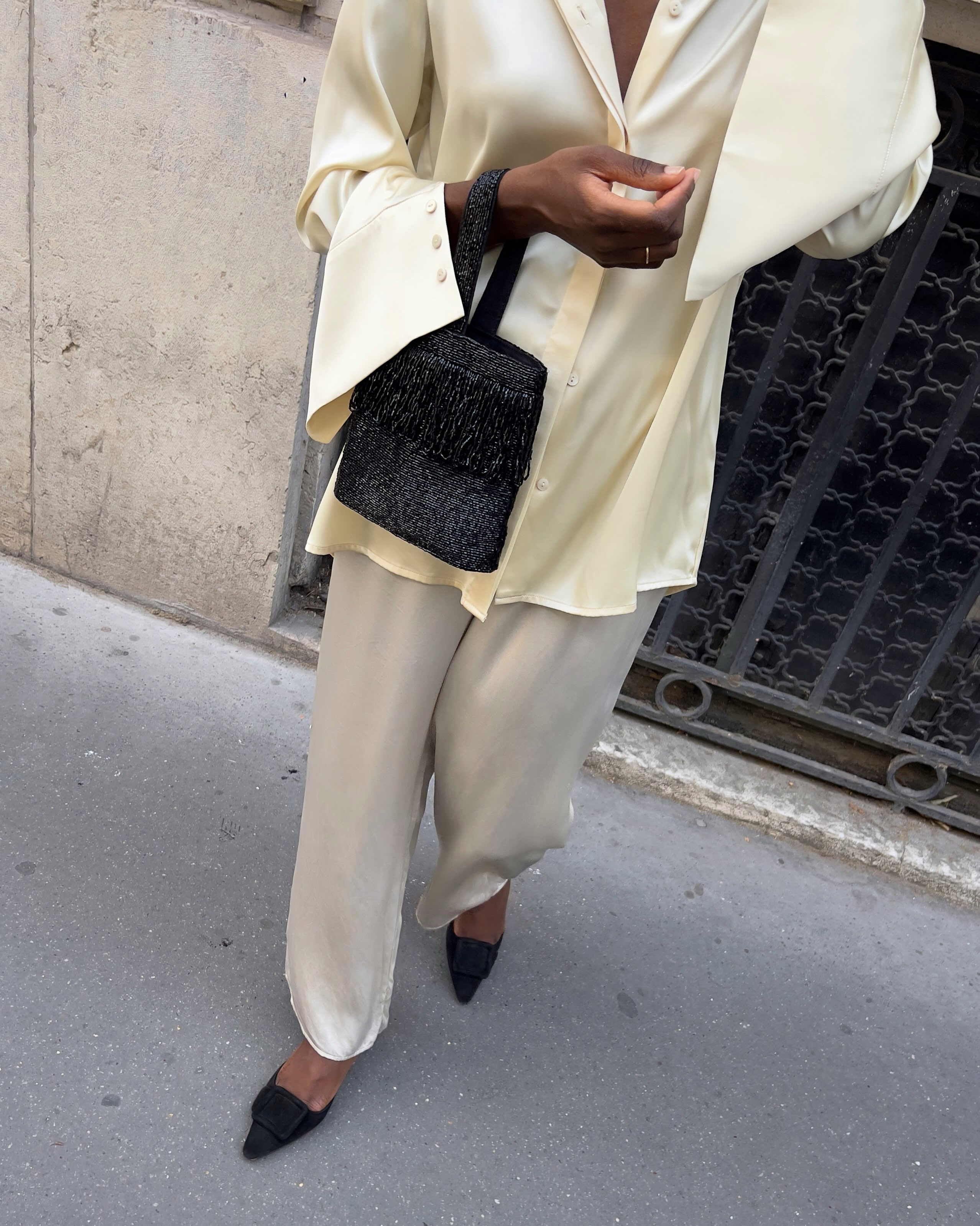 An image of a woman wearing early fall trendy outfit idea 2026