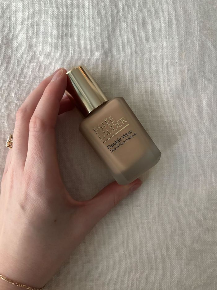 Deputy beauty editor Grace Lindsay holding the Est&eacute;e Lauder Double Wear foundation