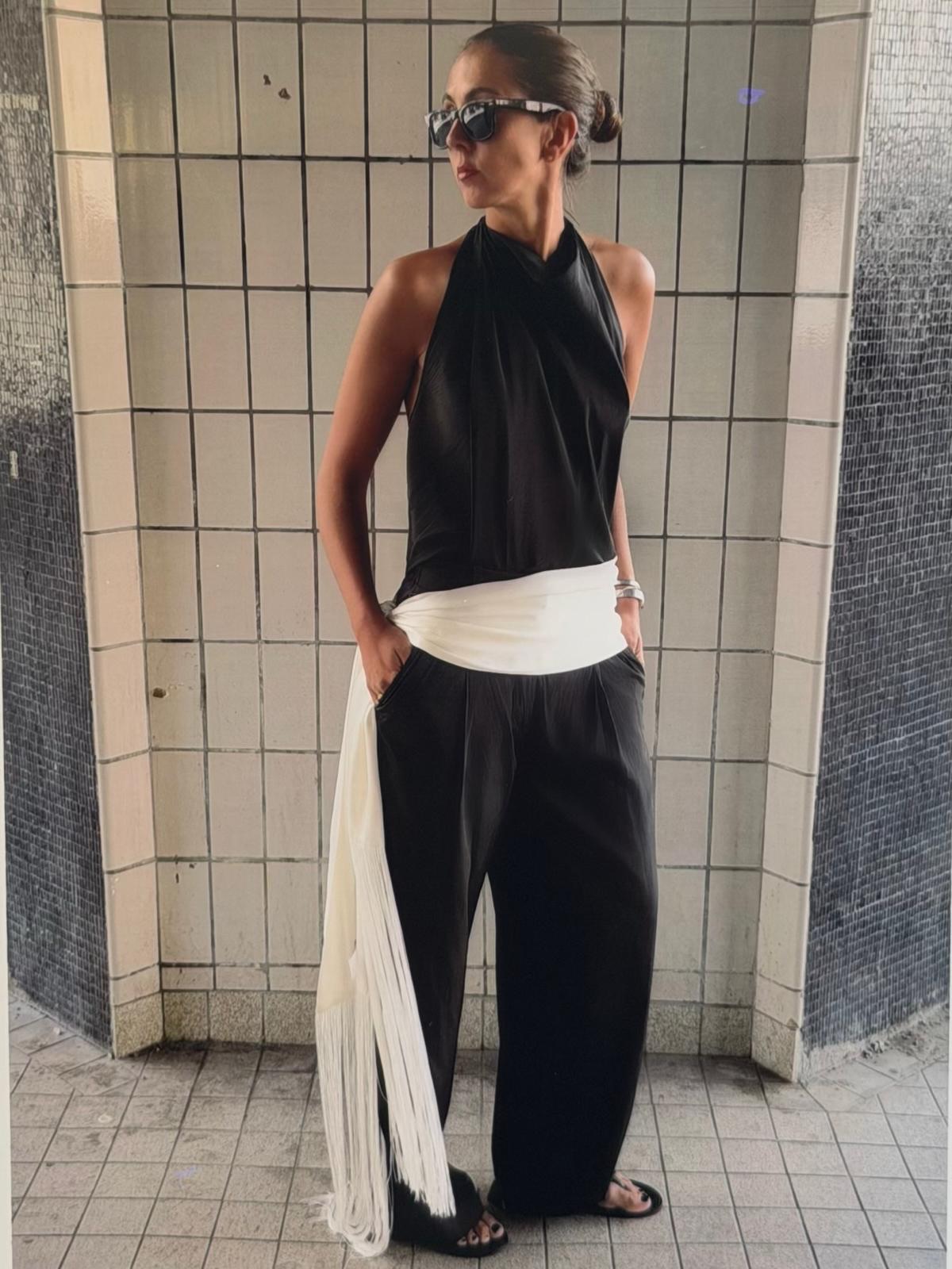 An image of a woman wearing early fall trendy outfit idea 2026