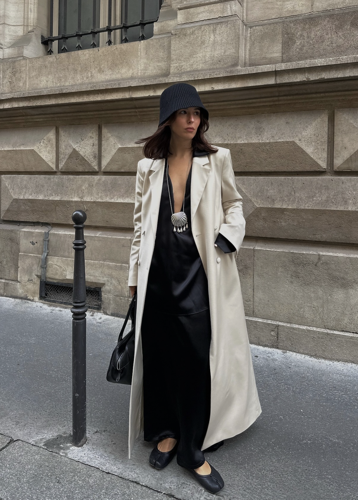 Debora wearing black tabi flats