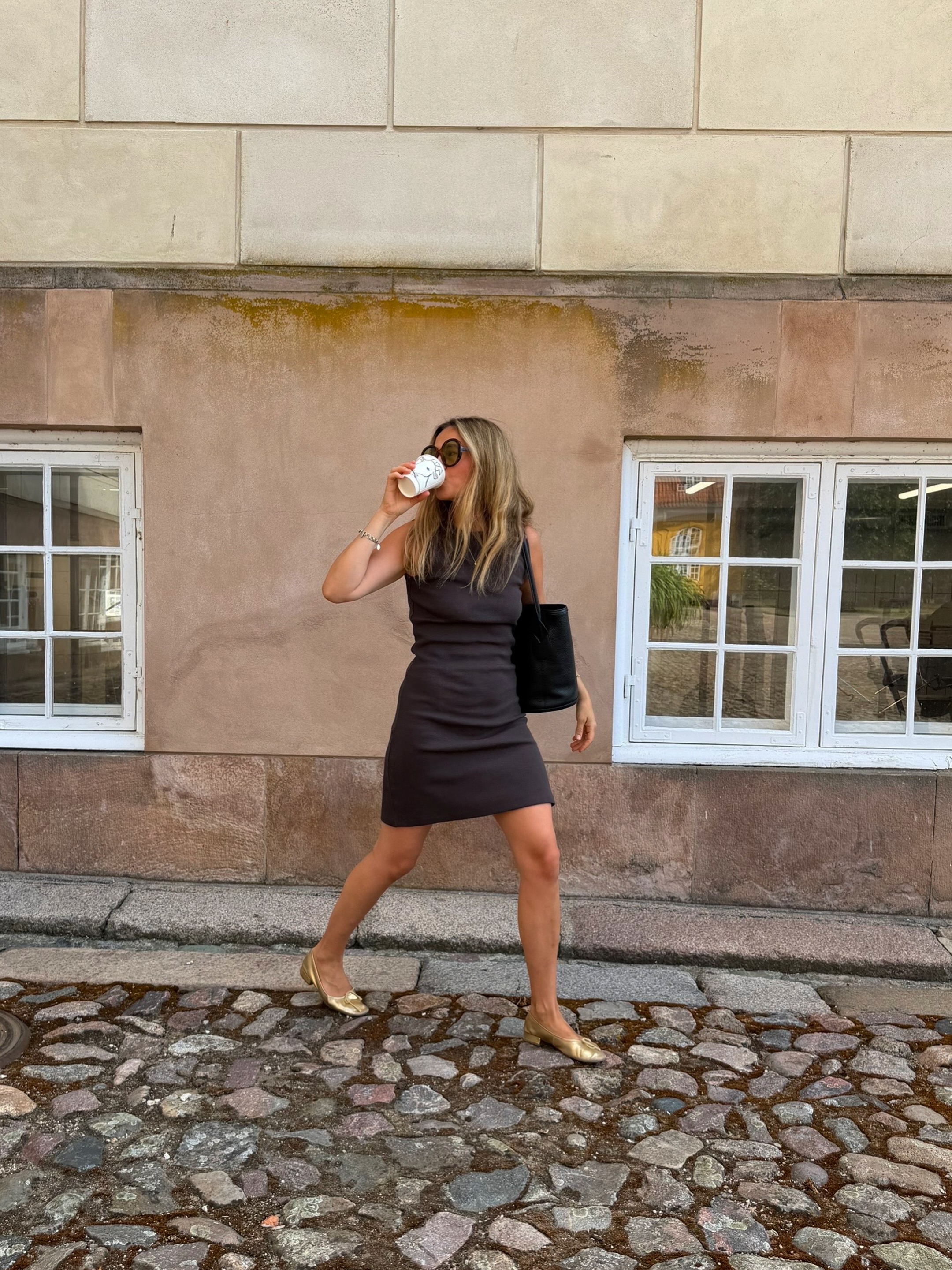 An image of a woman wearing metallic ballet flat trend