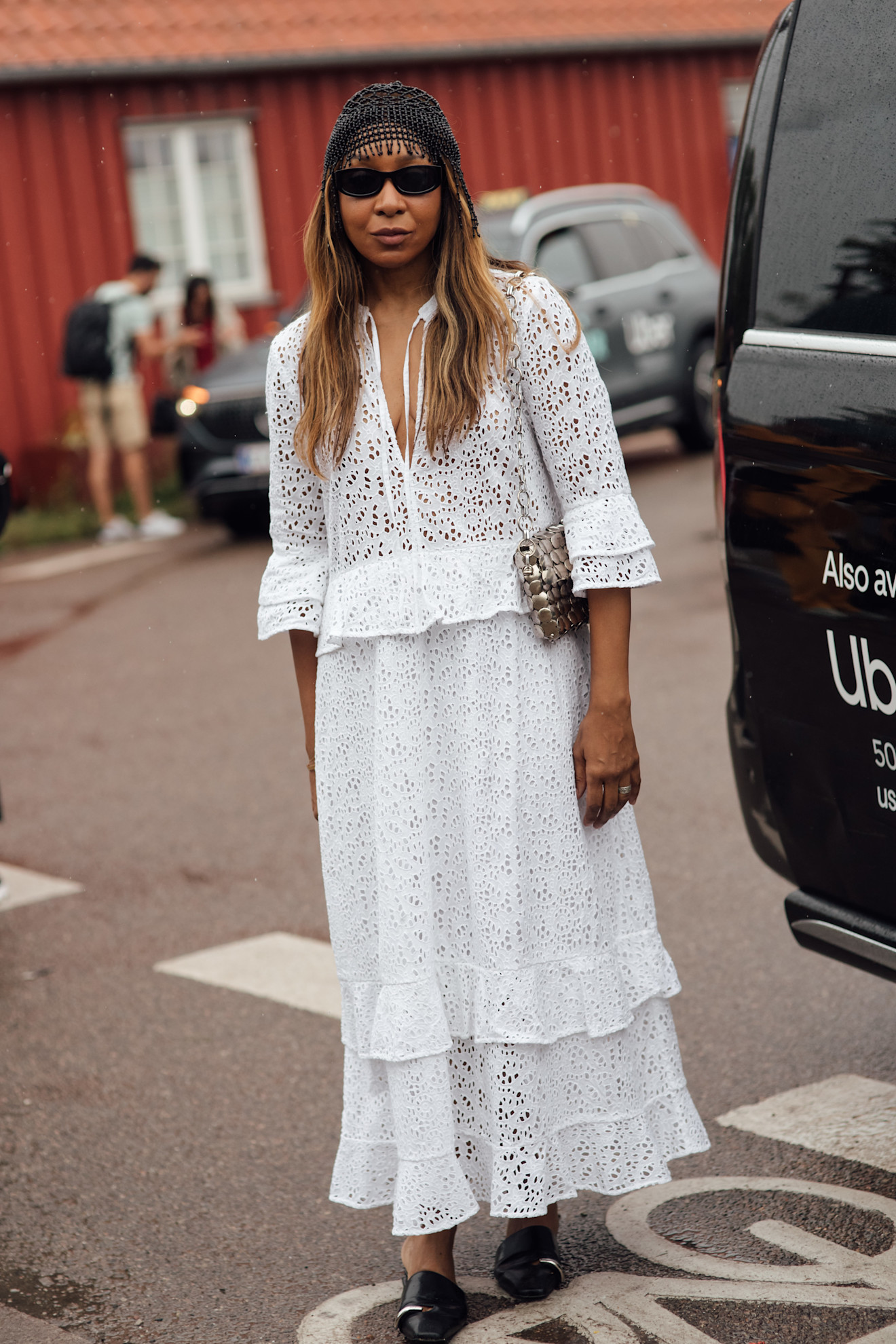 Woman wearing white dress at Copenhagen Fashion Week Spring Summer 2027.