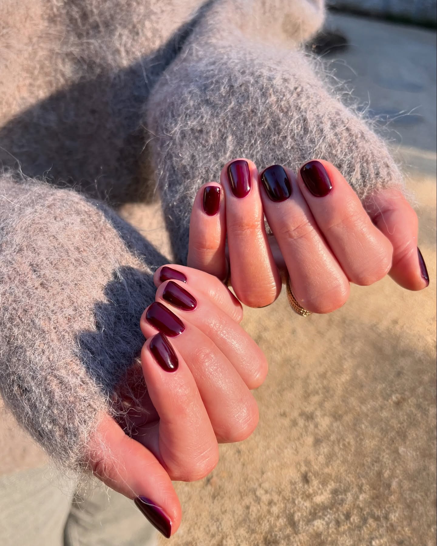 Photo of warm blackberry nails