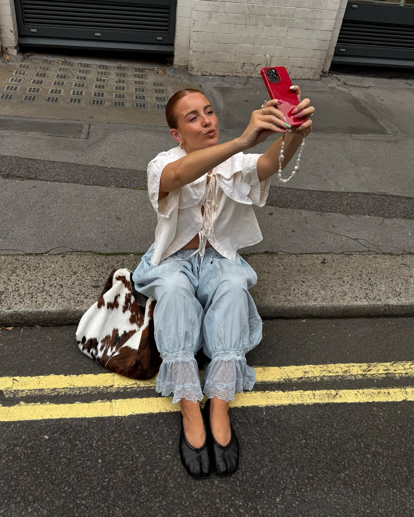Rebecca wearing Tabi ballet flats