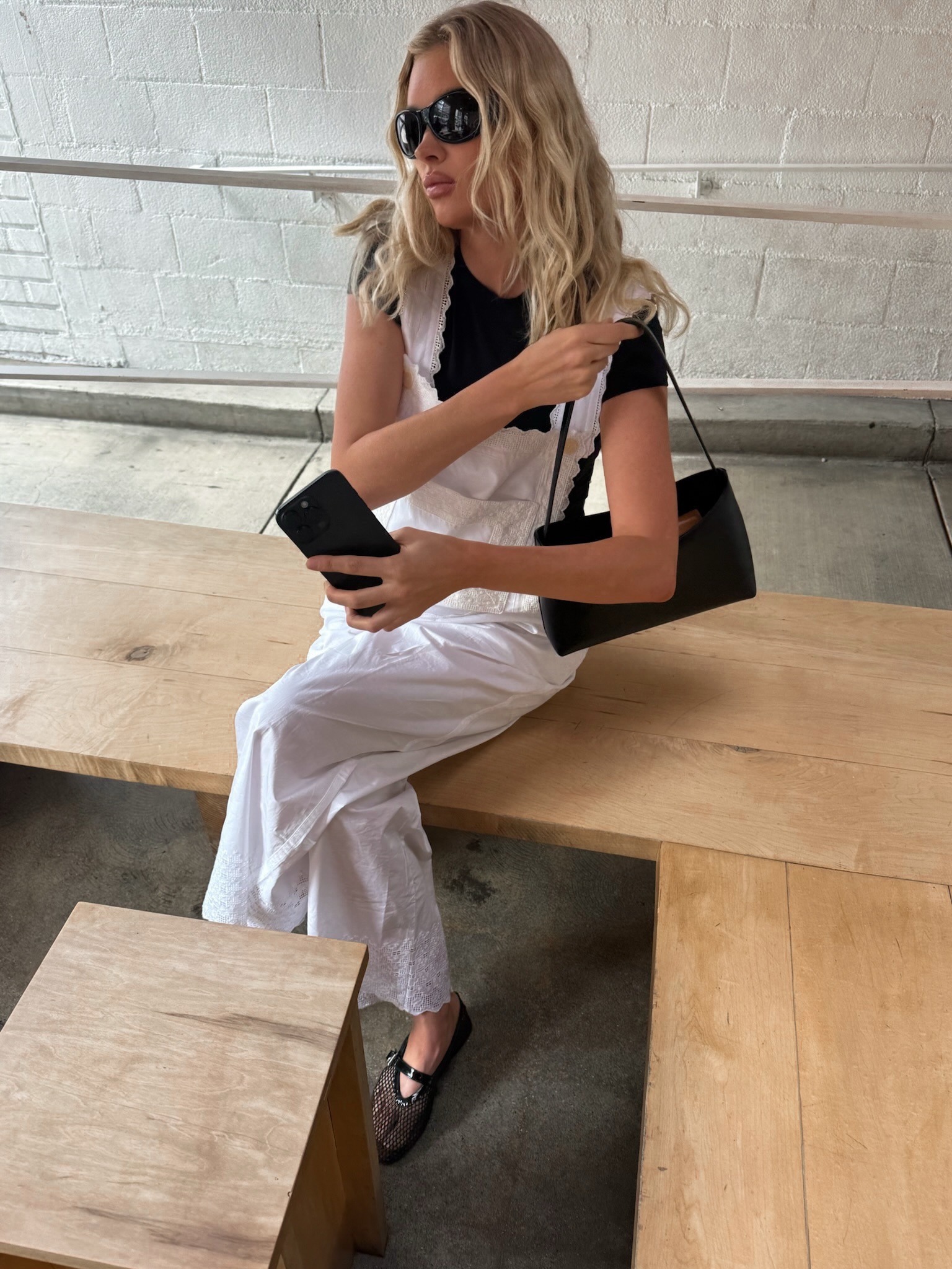 Elsa Hosk wearing The Row Alma bag