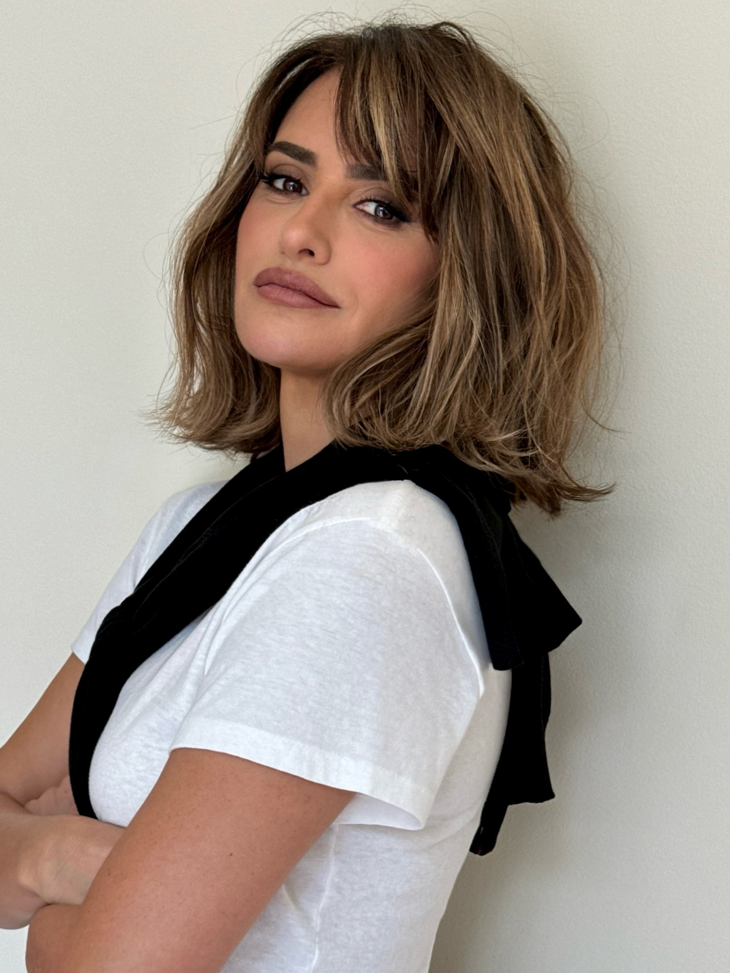 Penelope Cruz with a highlighted brunette bob.