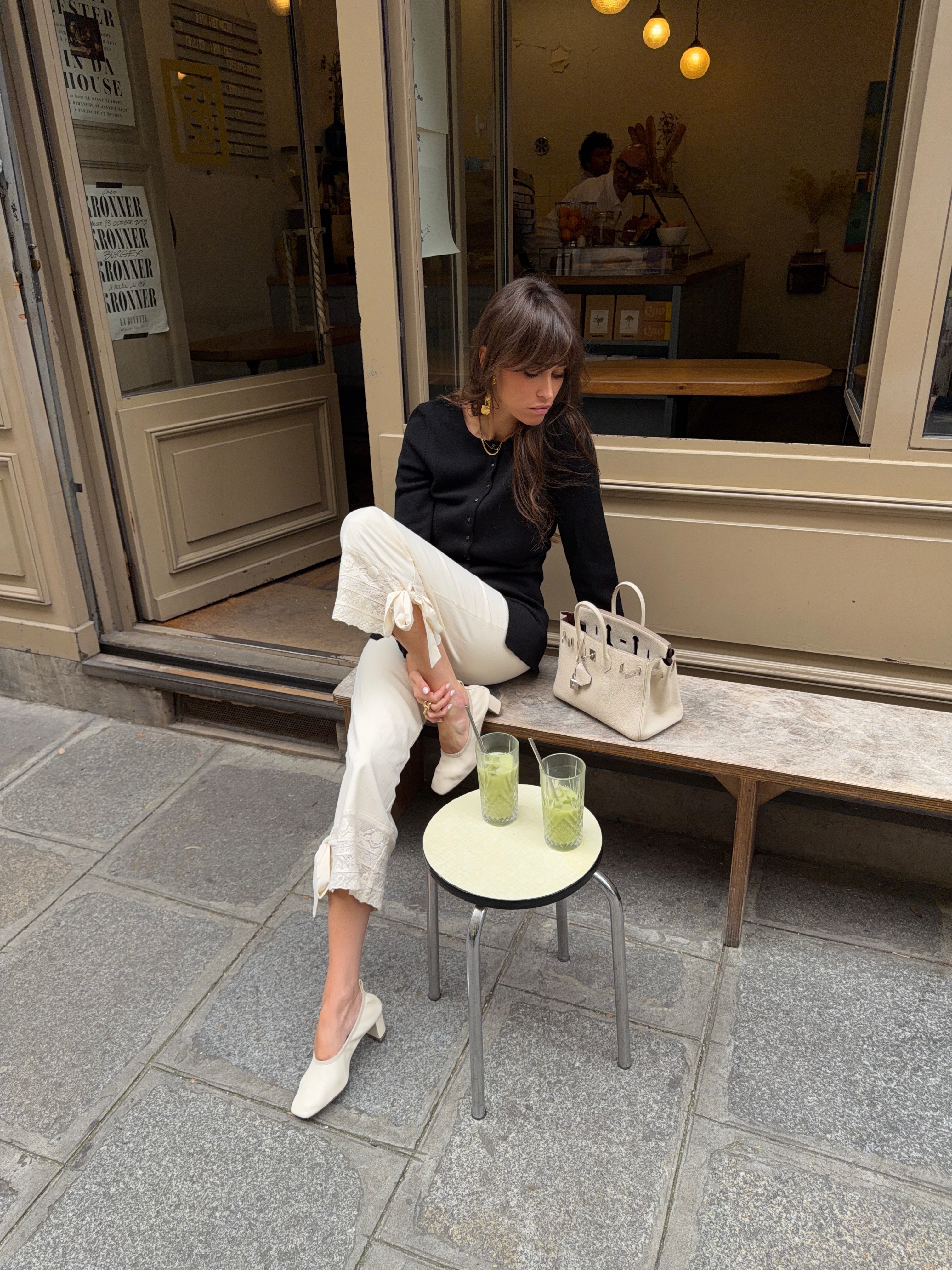 An image of @alisontoby wearing bloomer trousers with ballet pumps.