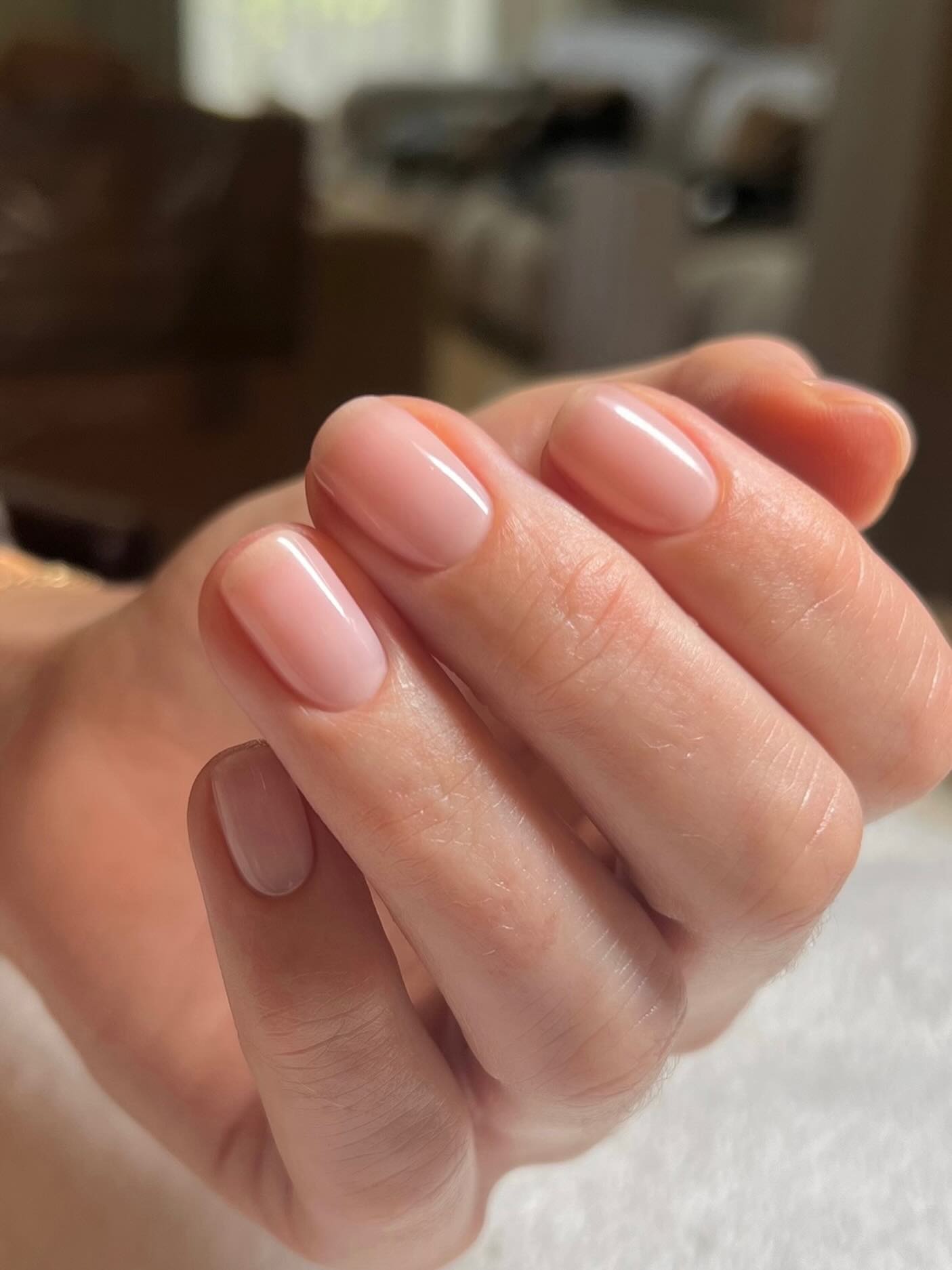 A neat, natural-looking manicure on short nails