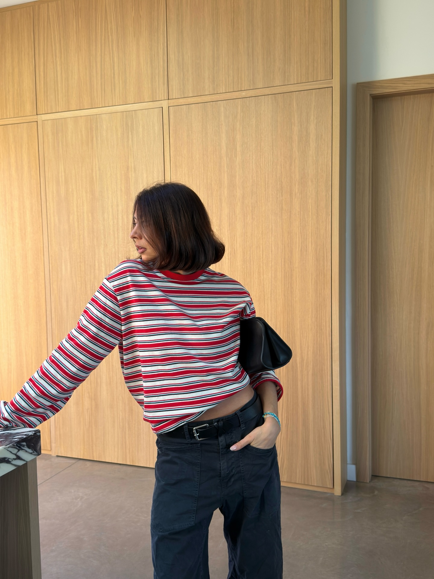 Influencer Marianne Smyth wearing a striped long sleeve t-shirt.
