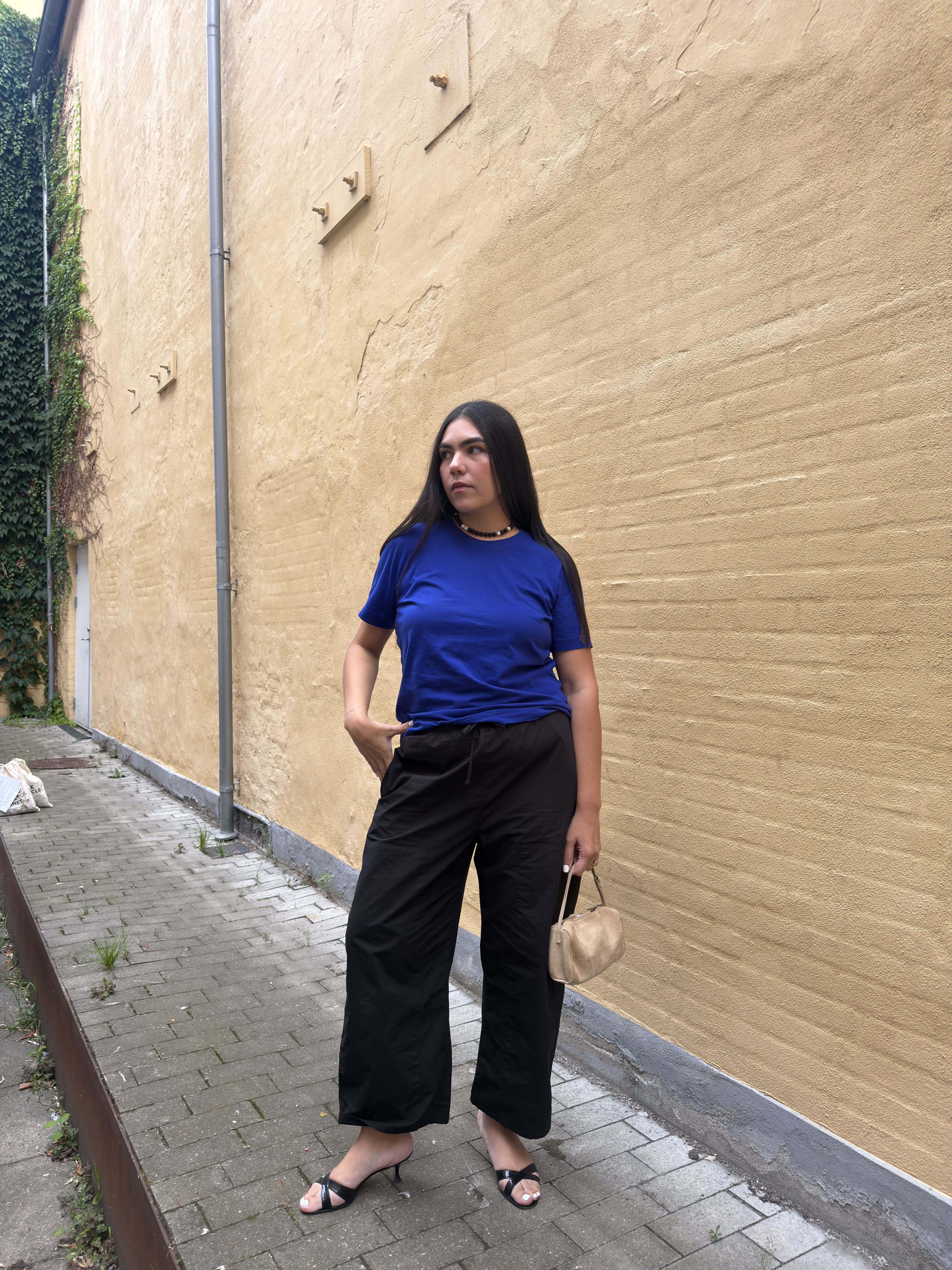 Ana Escalante wearing a cobalt-blue T-shirt in Copenhagen