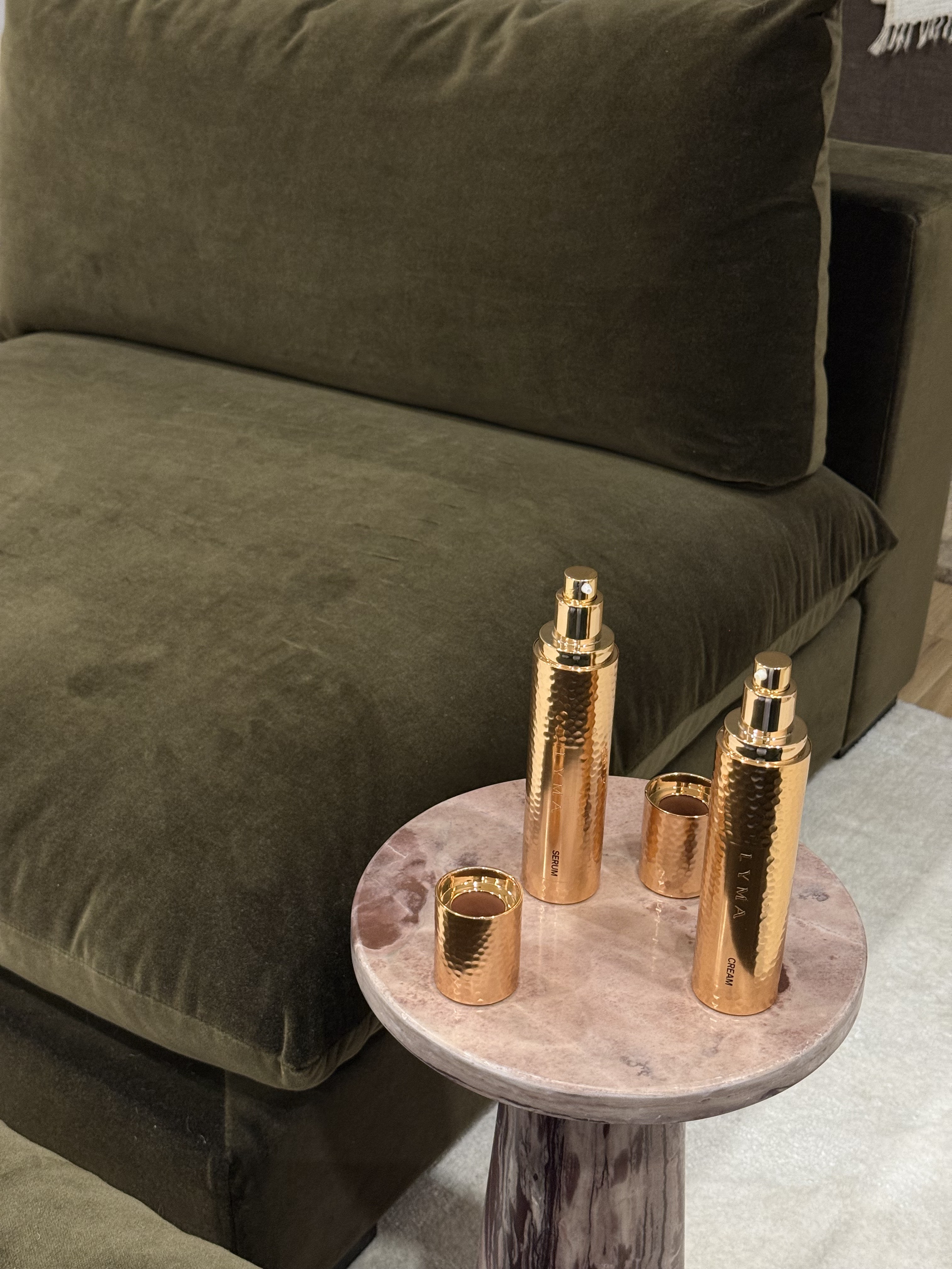 Lyma's Power Youth Skincare sitting on a side table.