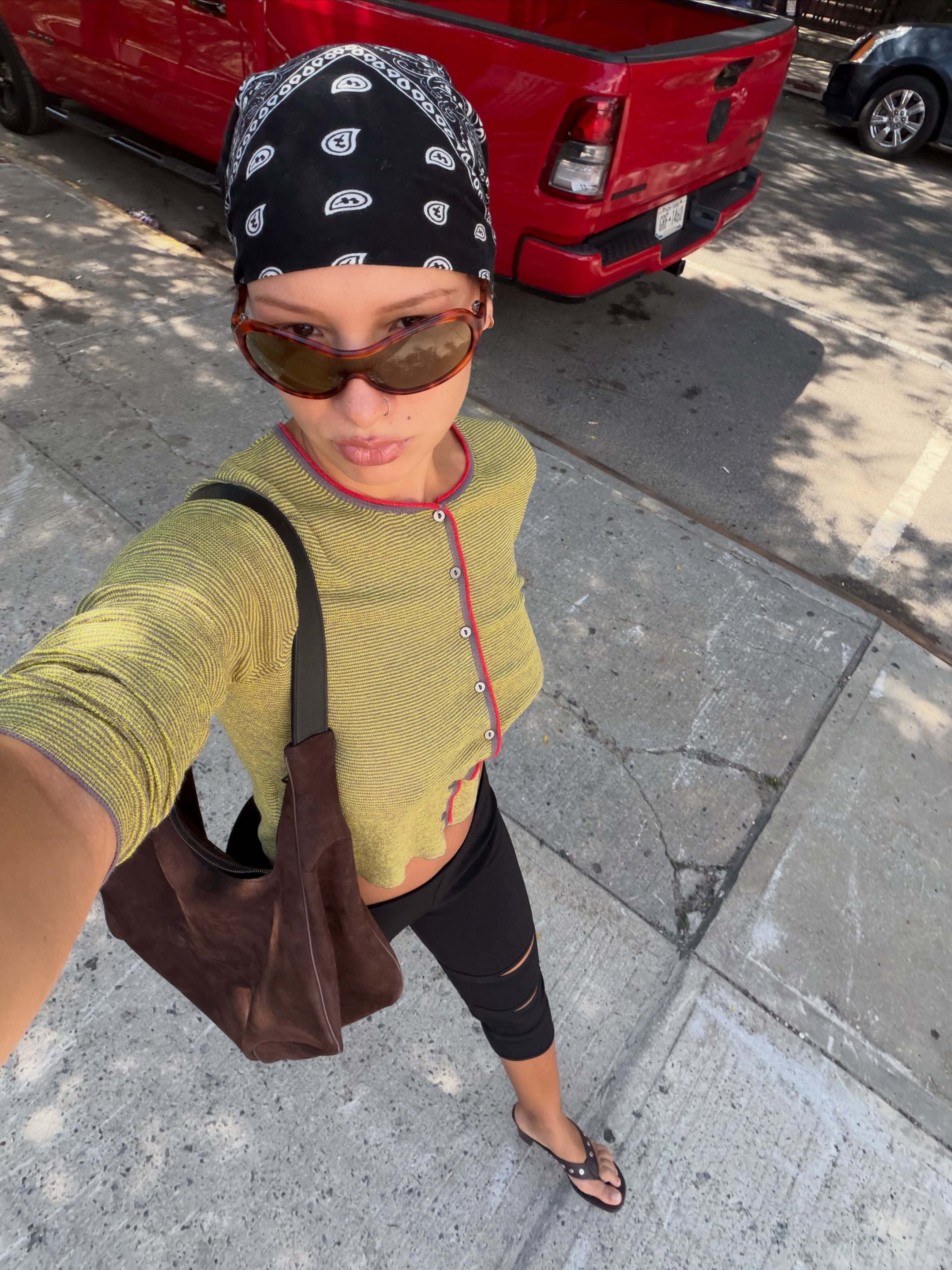 A woman wearing fall shoes with capri pants in 2026.