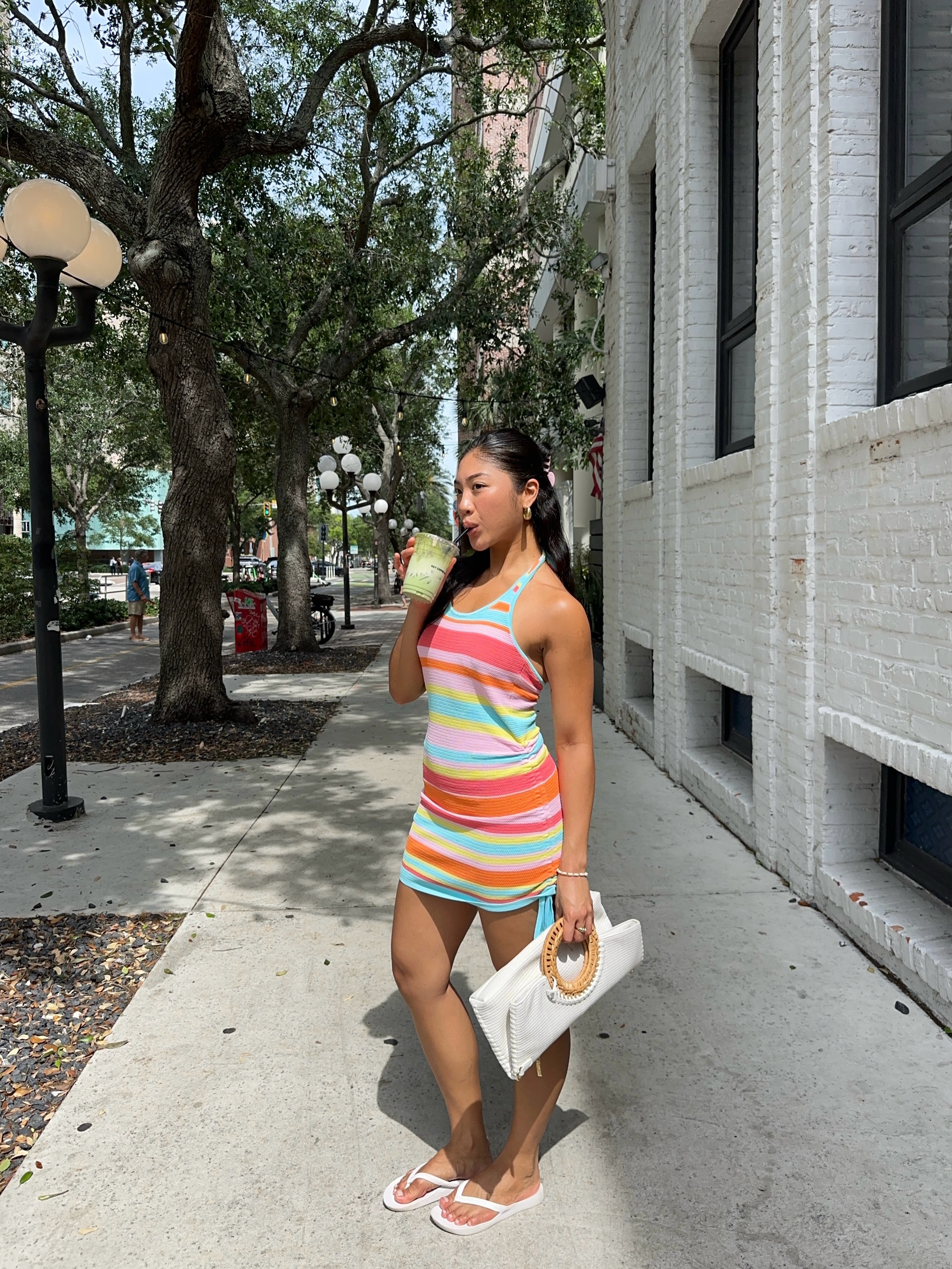 An image of a woman wearing striped dress for summer 2026