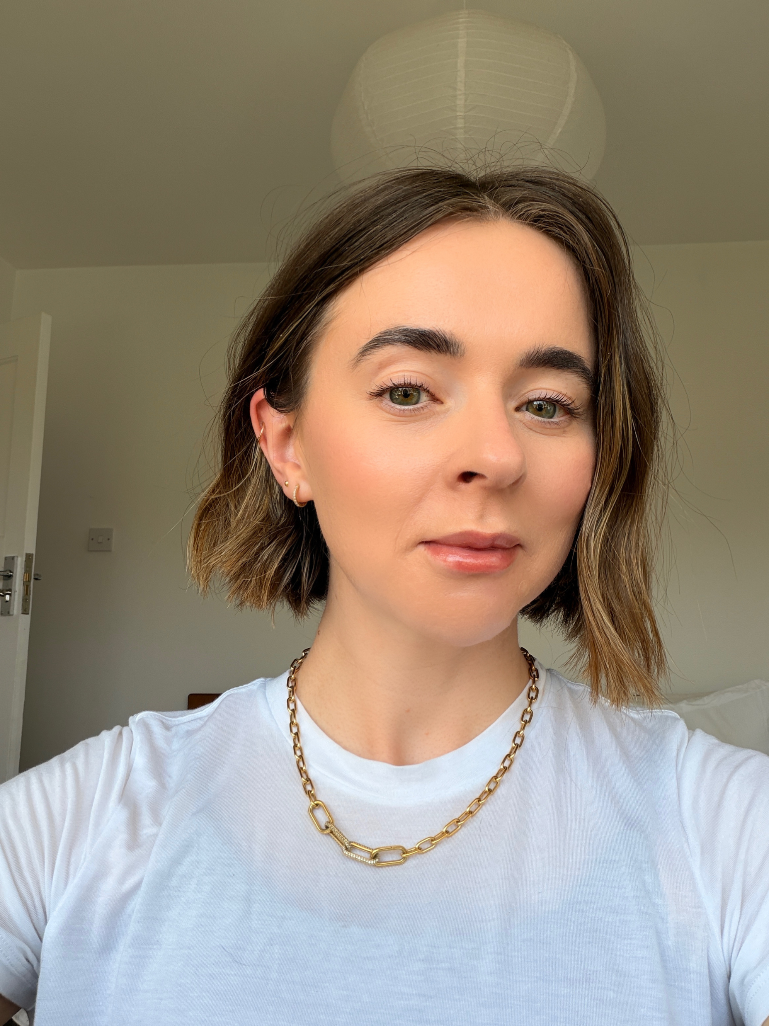 Freelance beauty editor Grace Day wearing Chanel's lipstick in Honey Bliss