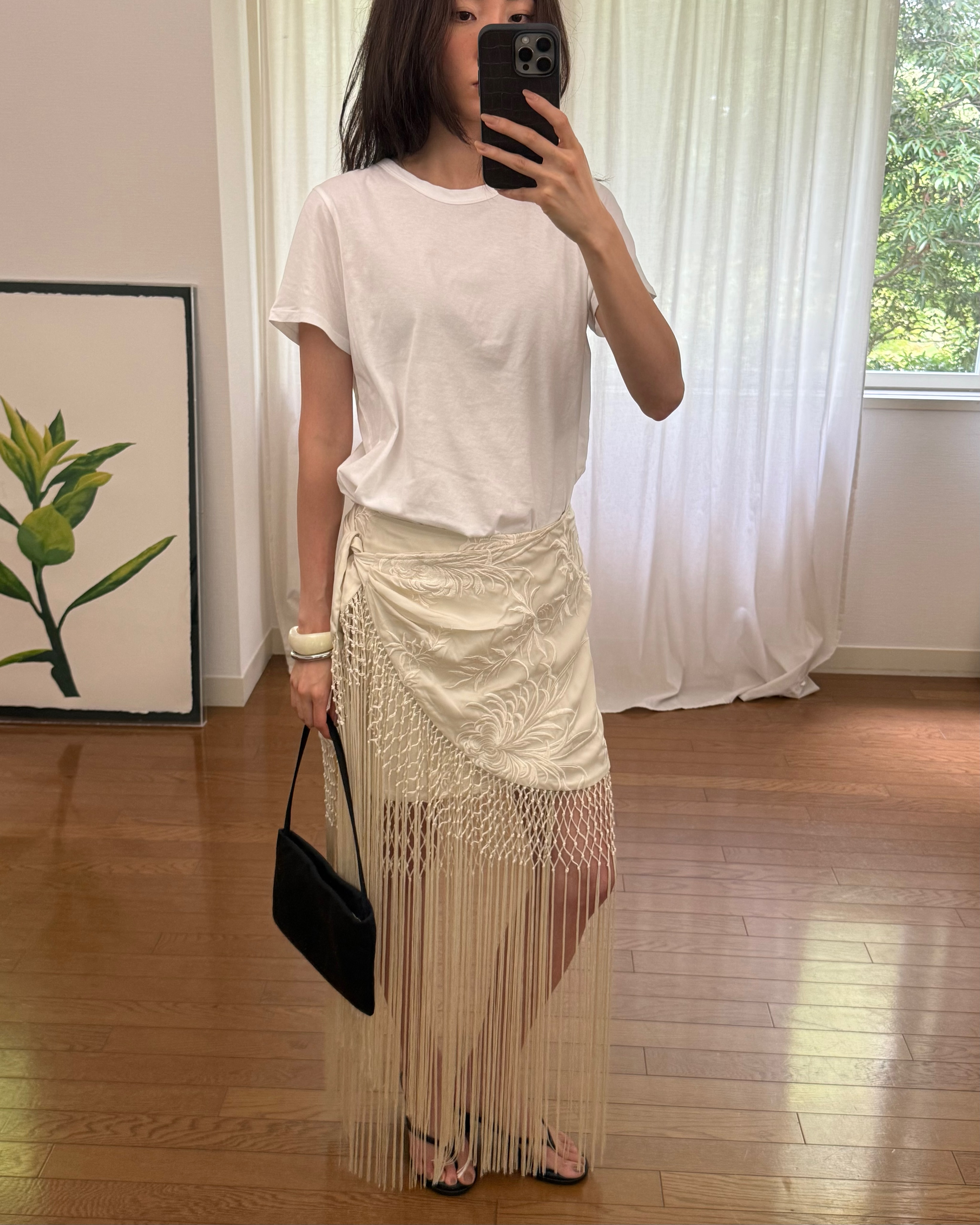 An image of a woman wearing best statement fall skirt 2026