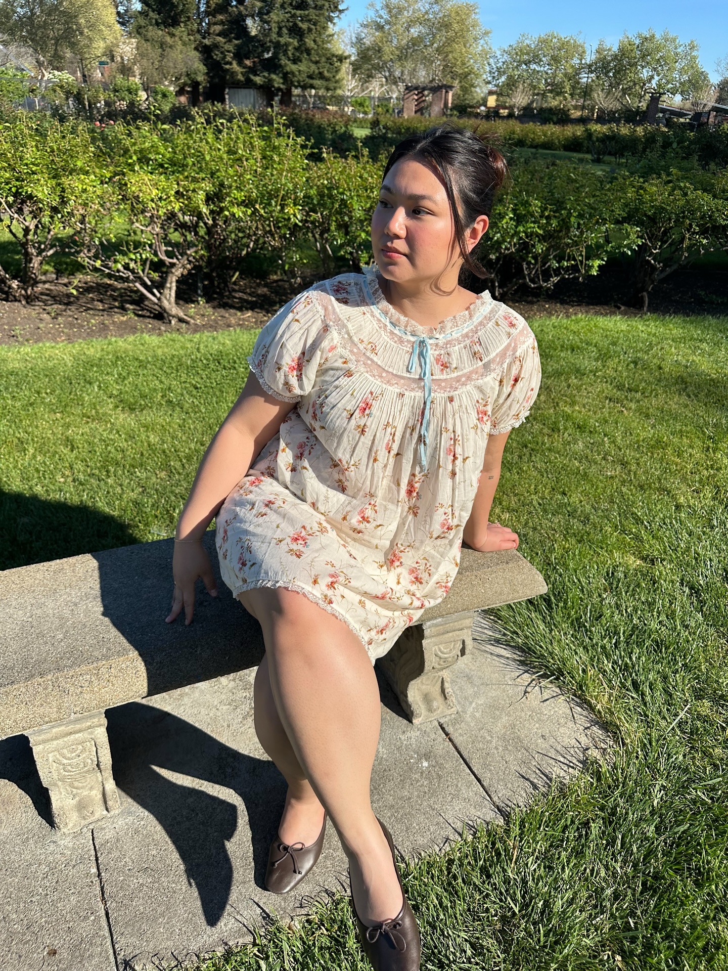 Influencer wearing babydoll dress.