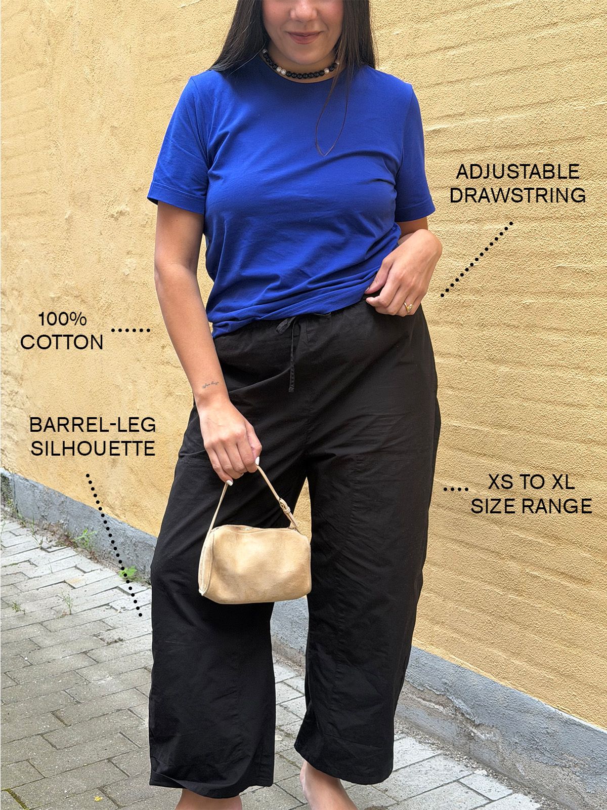 Who What Wear editor Ana Escalante wearing LESET Kyoto Carpenter pants.