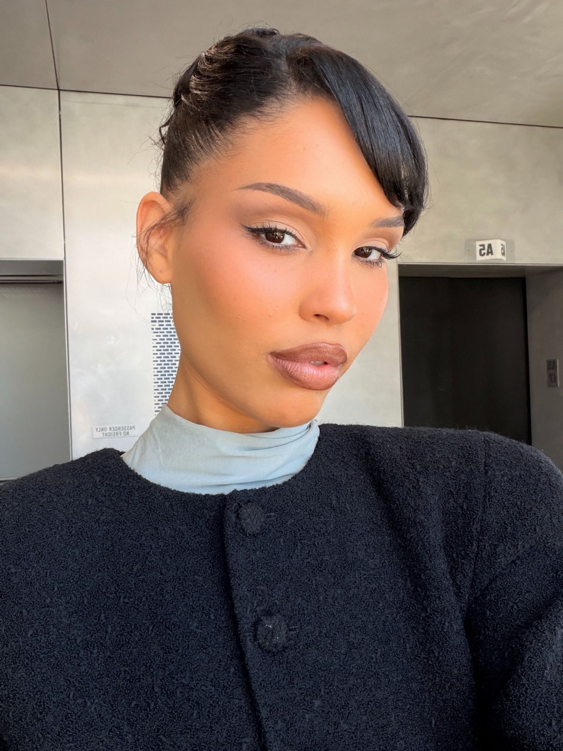 Nara Smith wearing ivory matte eye shadow and a cut crease.