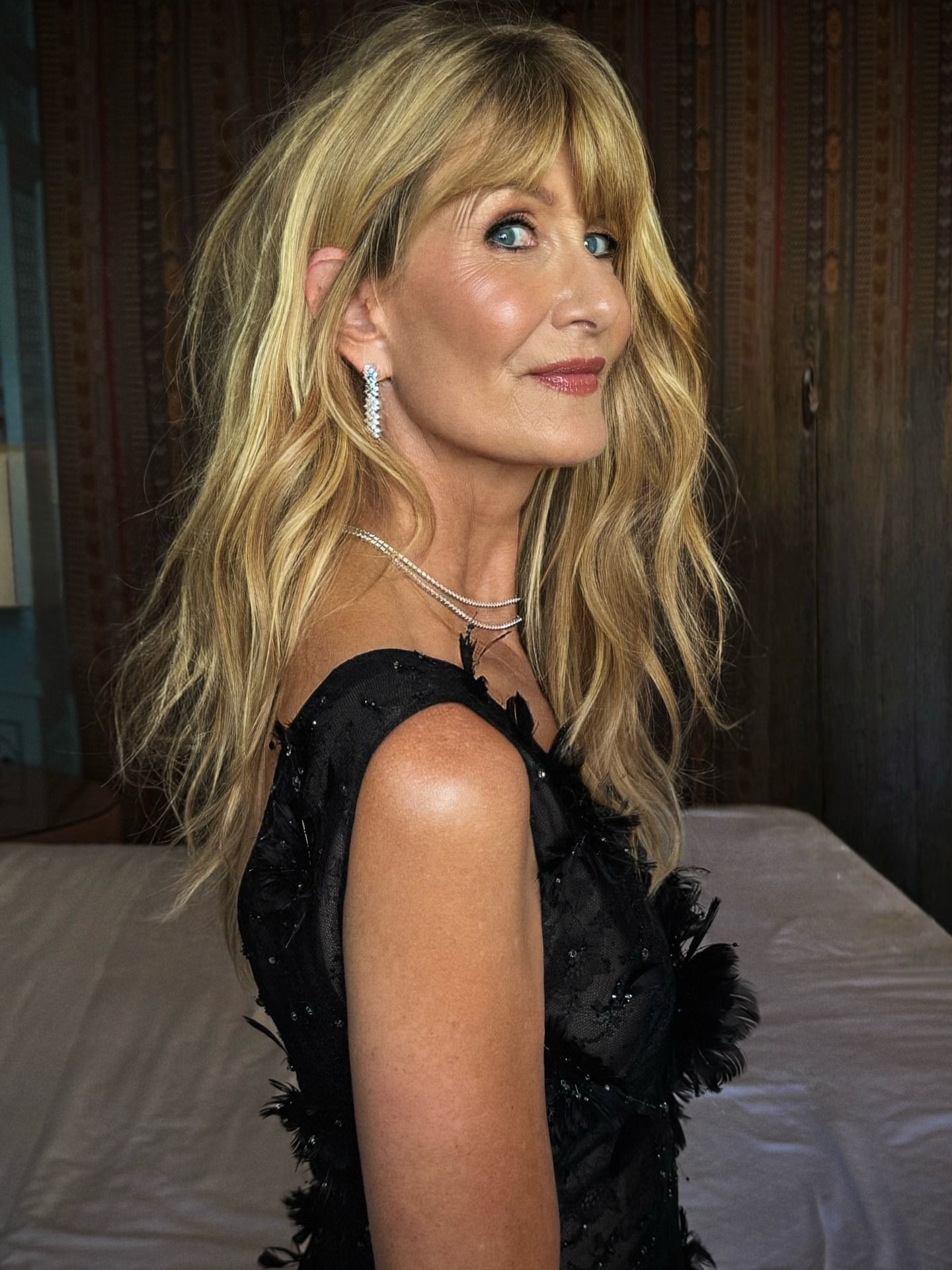 Laura Dern with warm blonde hair