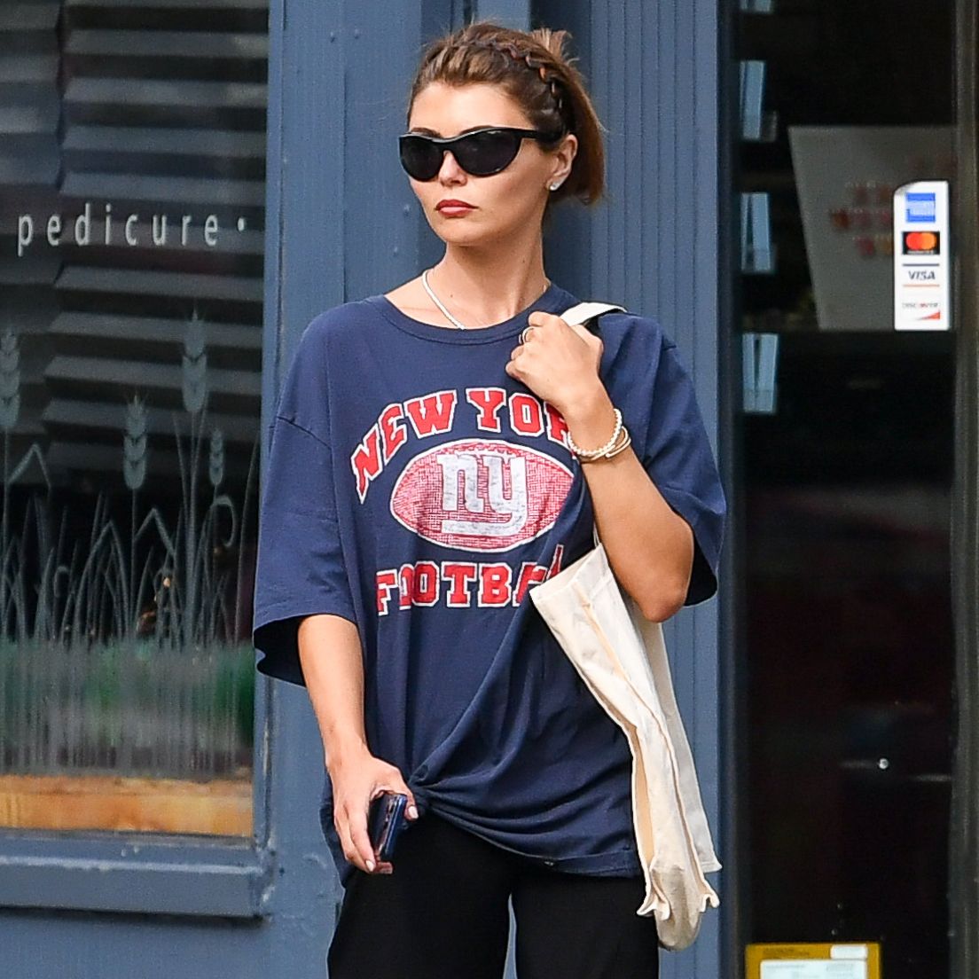 It Girls Already Know That This Is Now the Chicest Fall Shoe Color Trend to Wear With Black Pants