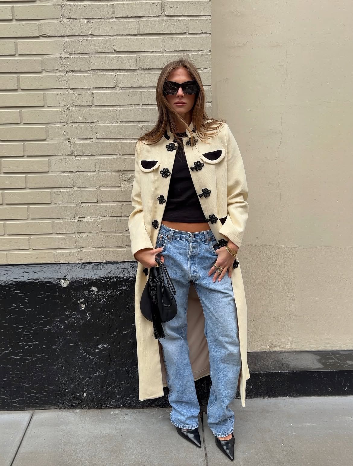 Statement coat and sunglasses.