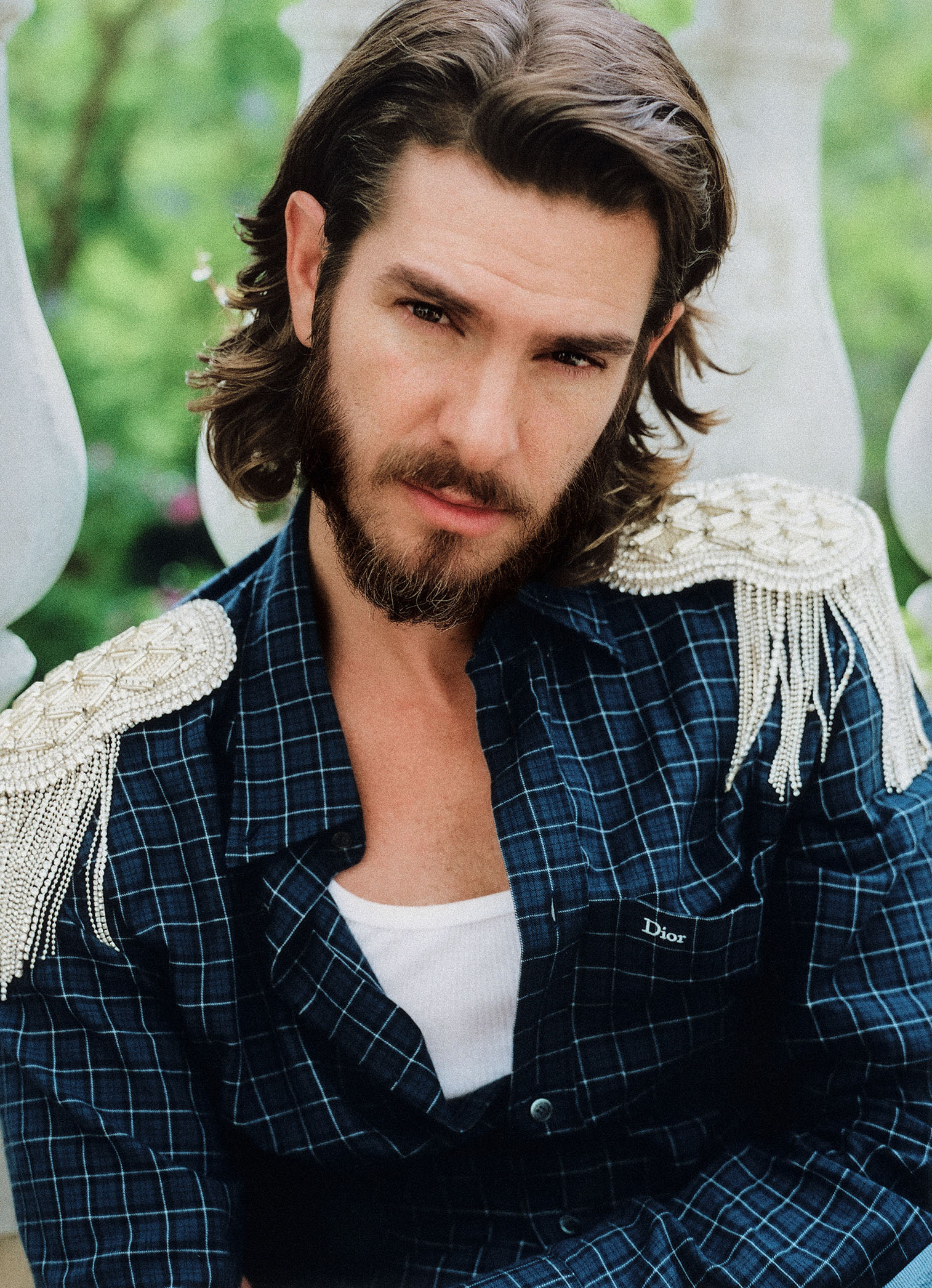 Andrew Garfield for Who What Wear's September cover wearing a plaid Dior button-down with beaded shoulder pads and a white undershirt.
