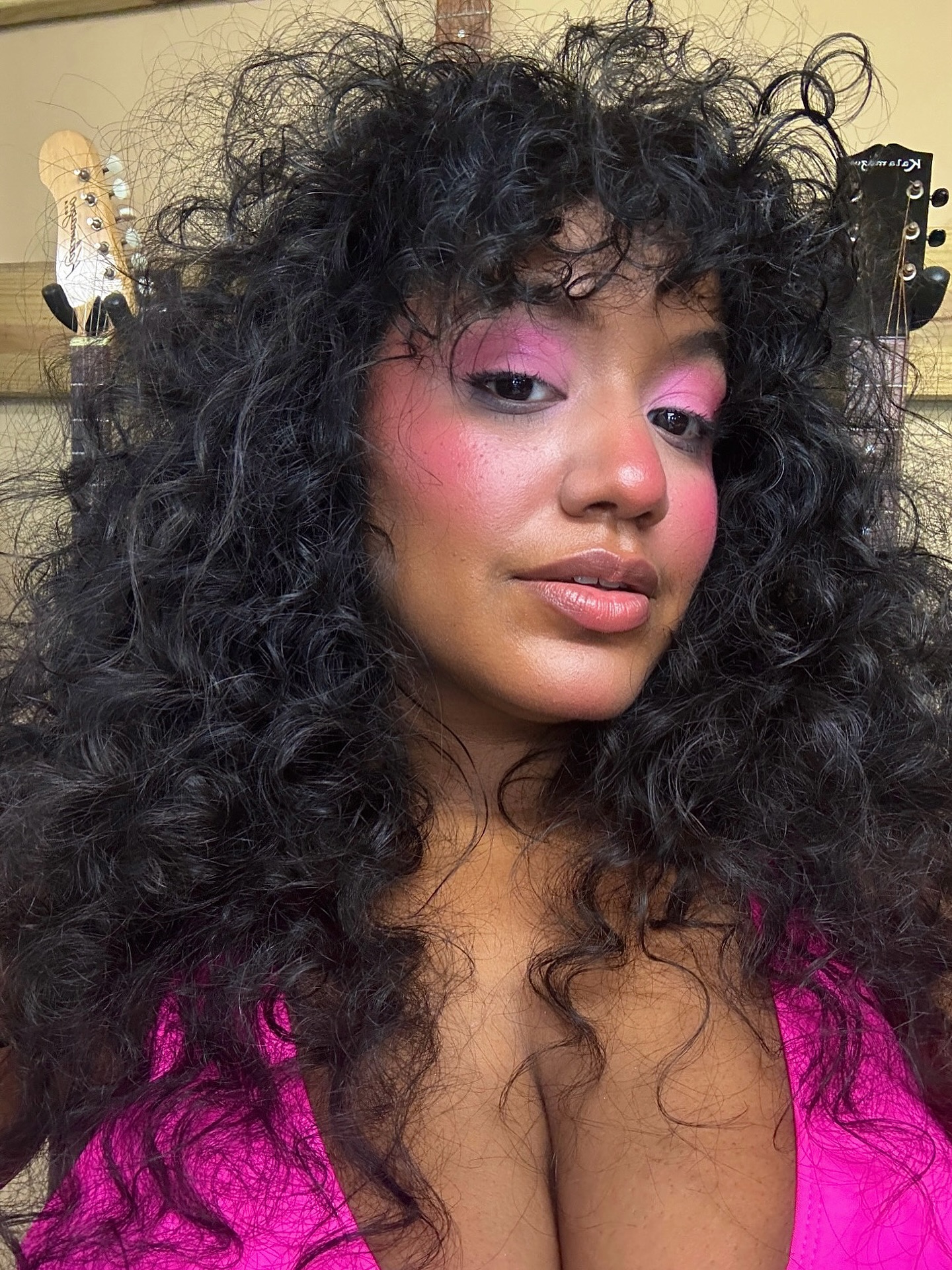 Photo of a curly modern wolf cut