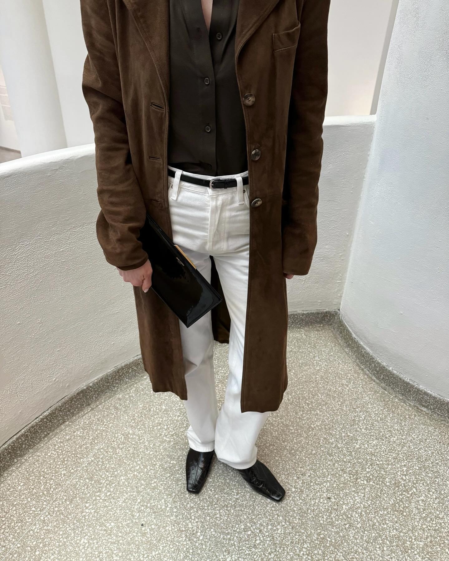 @rikkekrefting wearing a suede brown jacket