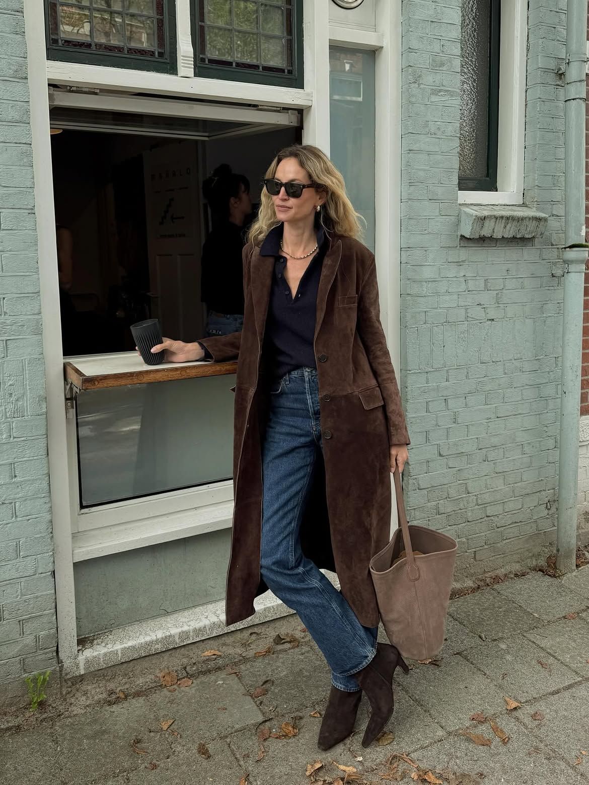 Anouk wearing suede boots
