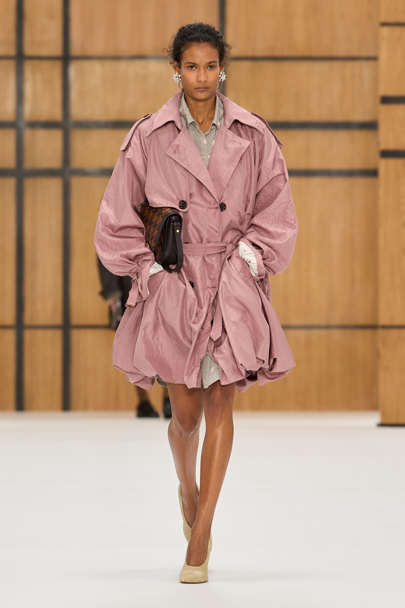 a model walks the burberry spring/summer 2027 runway.