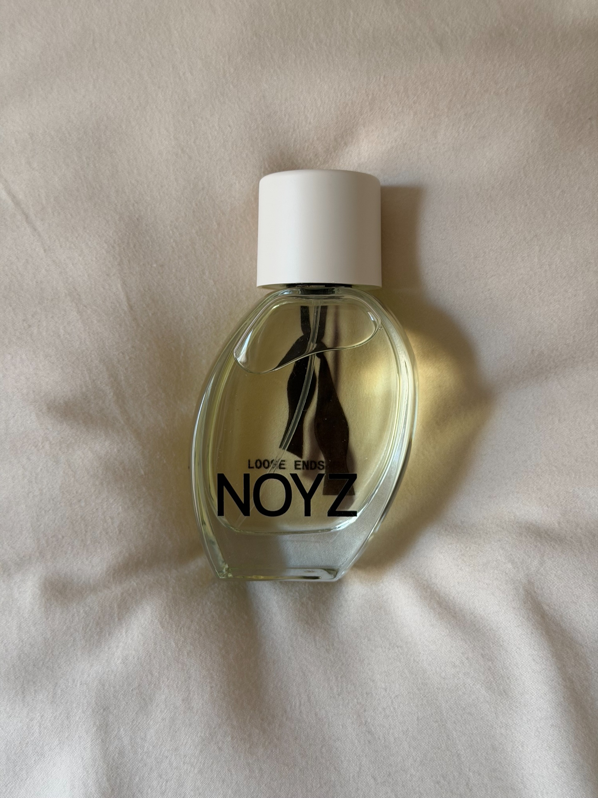 A bottle of Noyz's Loose Ends perfume.