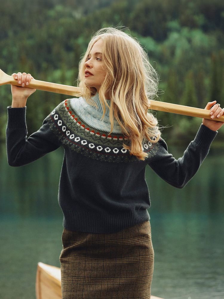 A model wearing a Joules Fairisle jumper.
