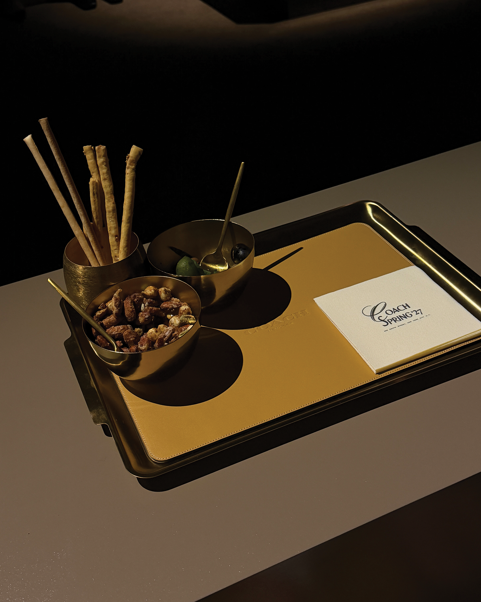 The snack selection at Coach's S/S 27 show.
