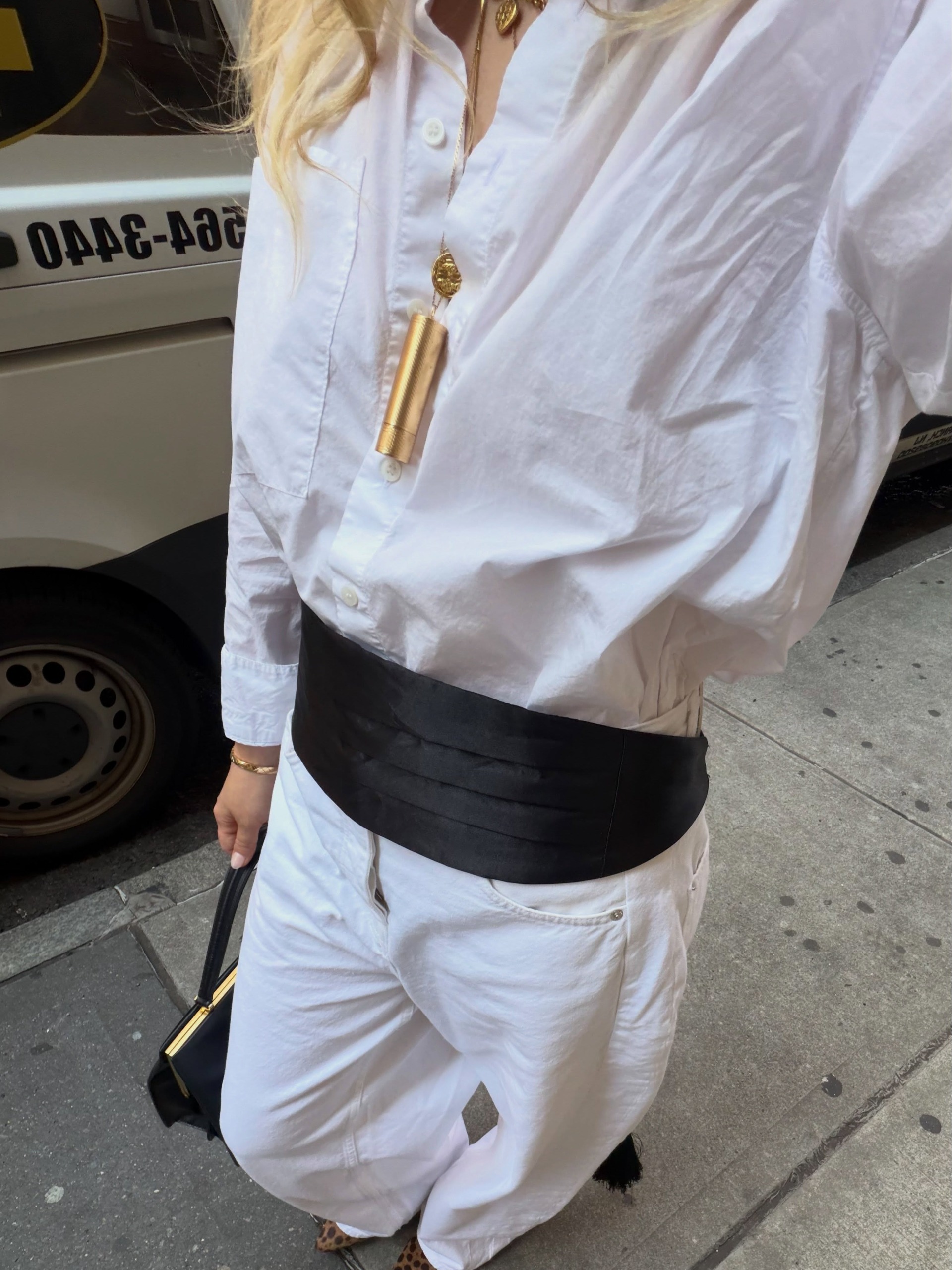 Influencer Christina Grasso wearing a cummerbund.