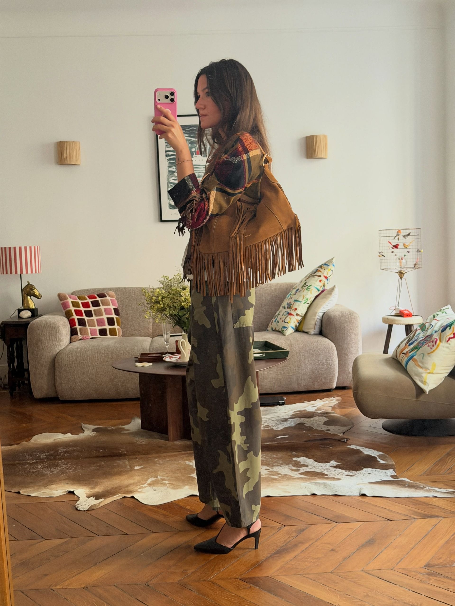 An image of a woman wearing best shoes to wear with camo pants fall 2026