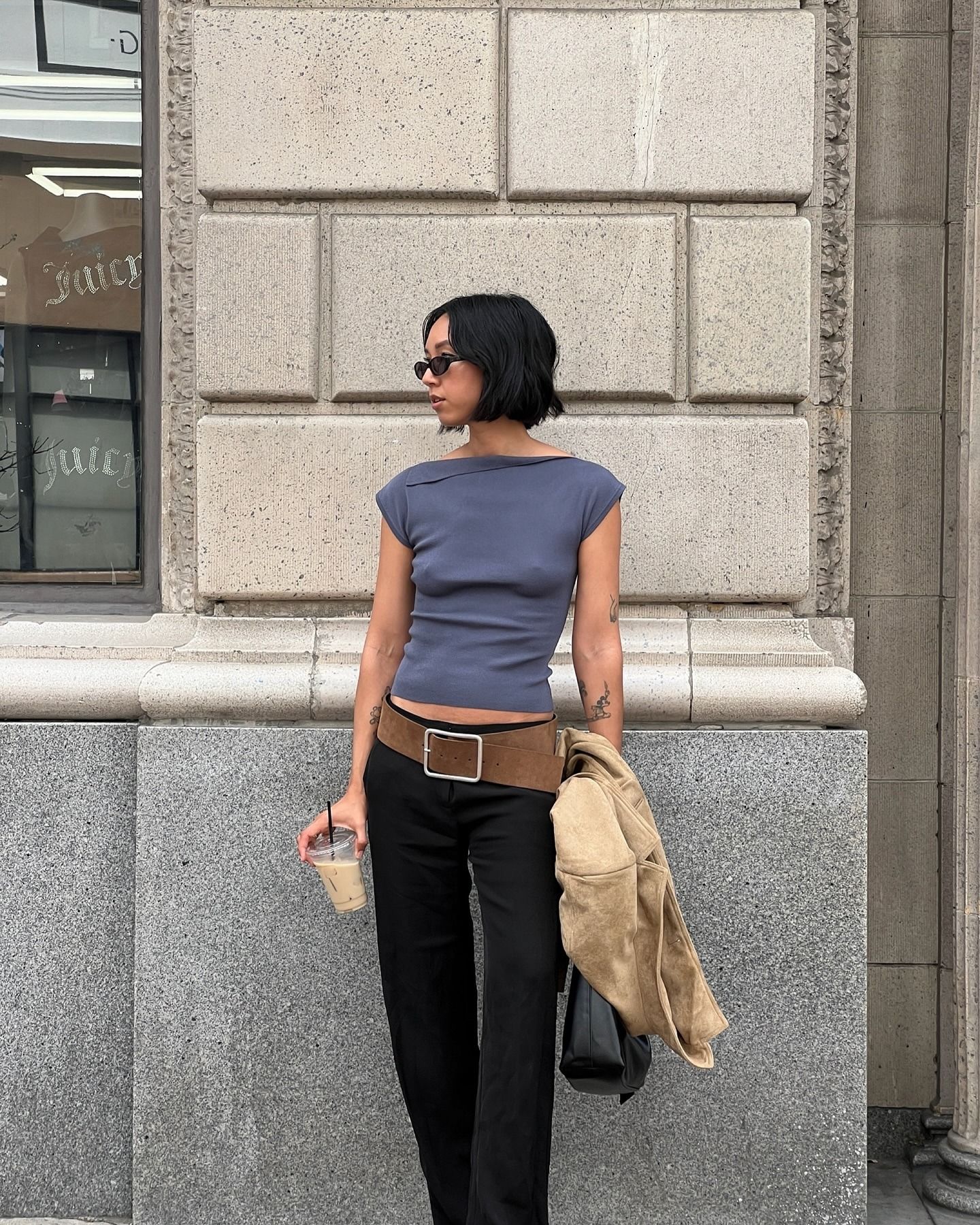 Woman in a boat neck top and pants