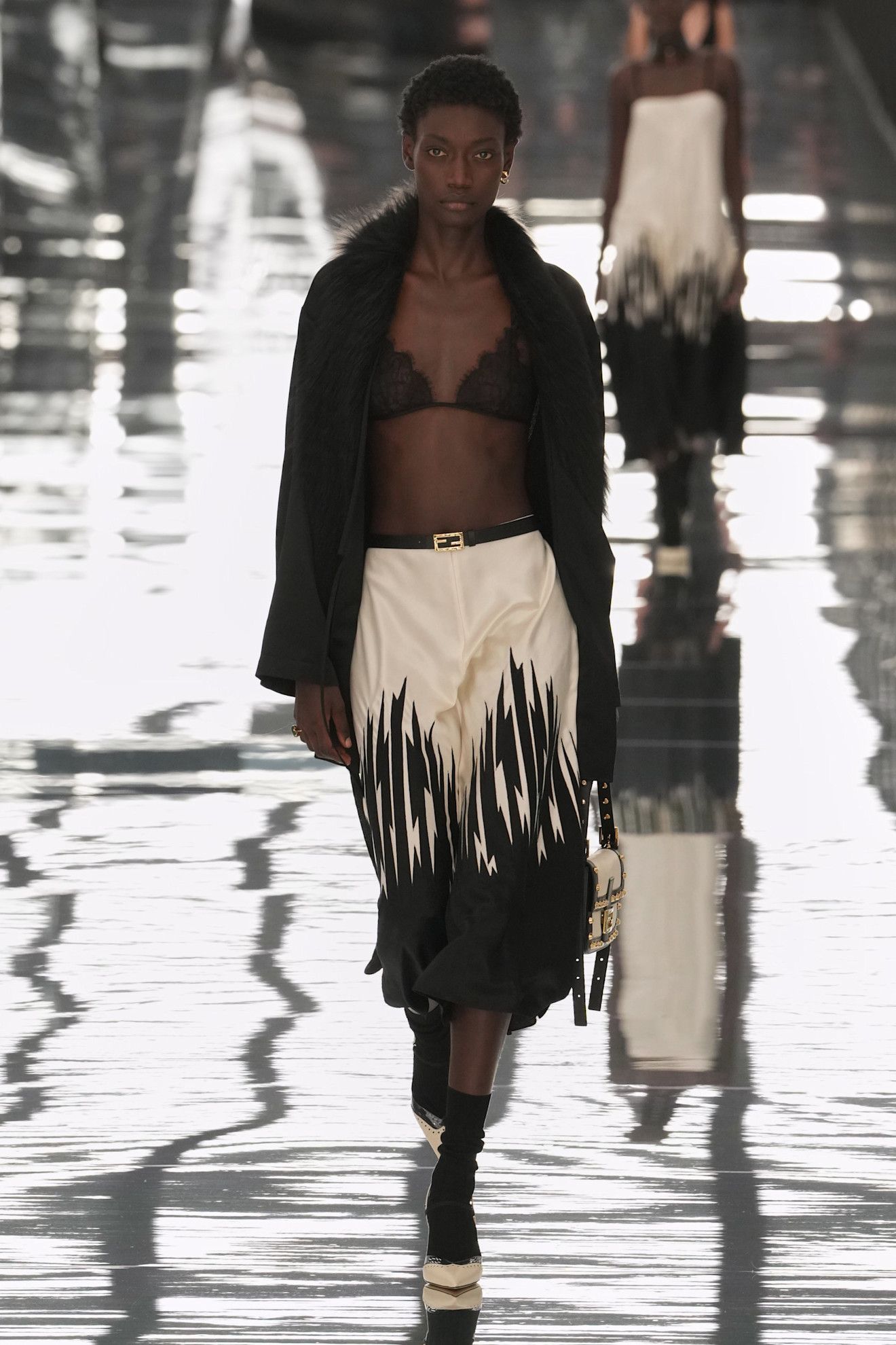Models walking down the runway at the Fendi spring/summer 2027 show during Milan Fashion Week.